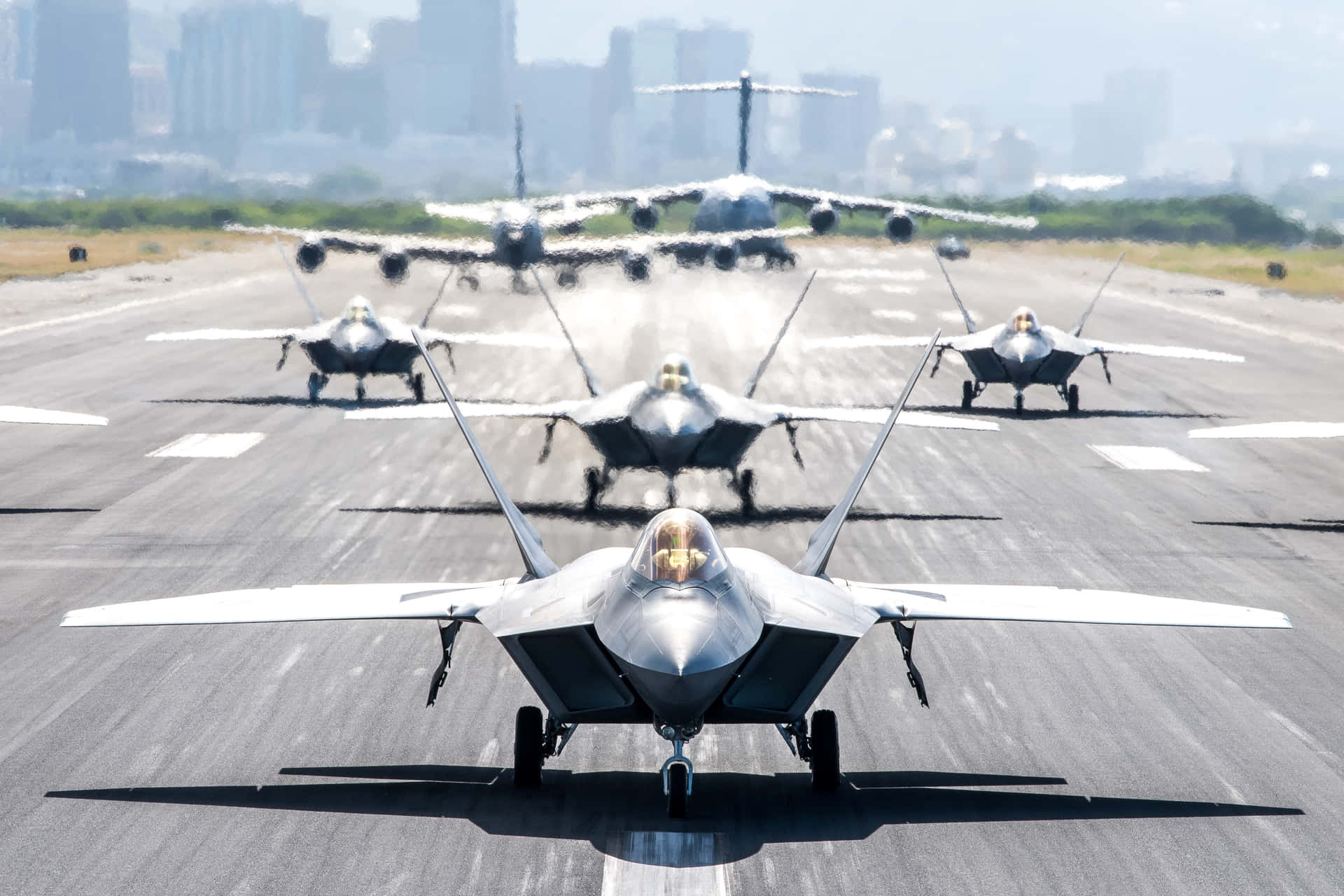 A Group Of Military Jets On Runway Wallpaper