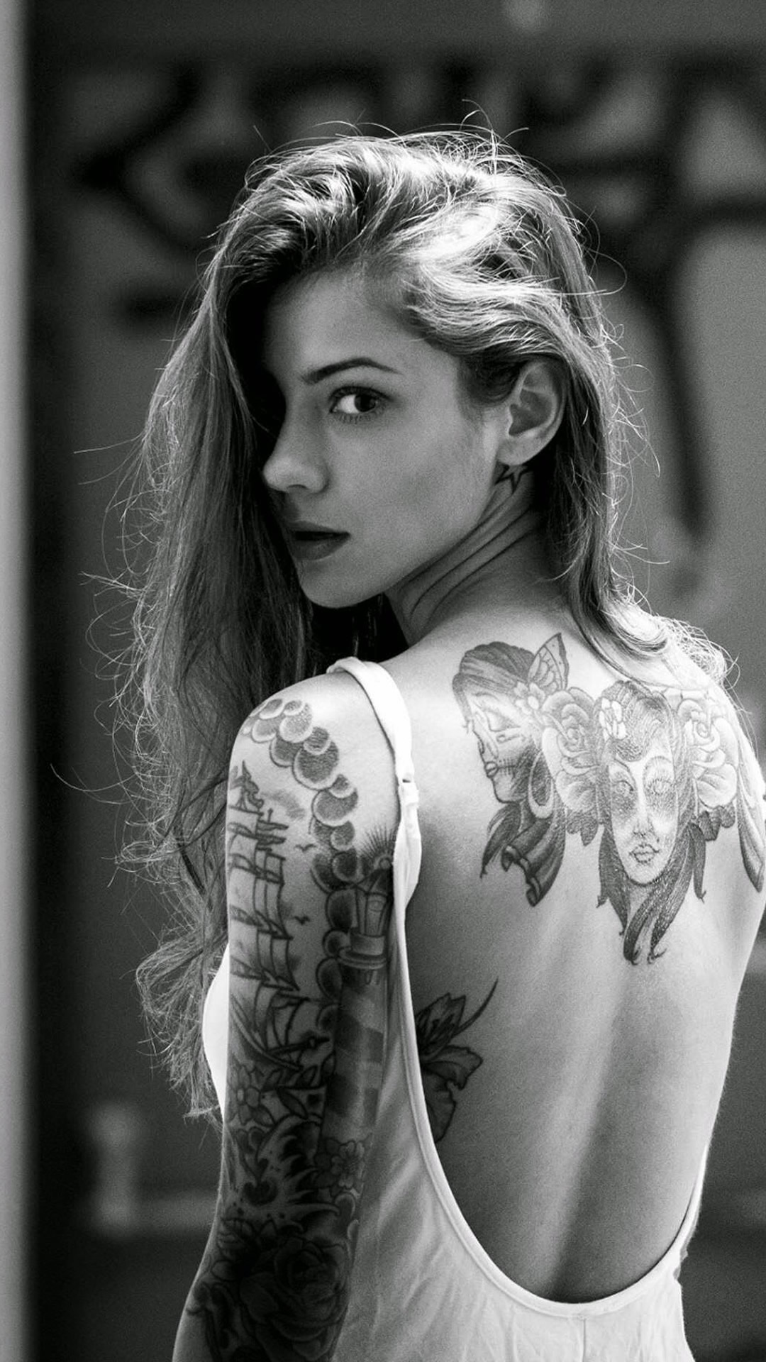 Beautiful Girl Tattooed Back iPhone Wallpaper