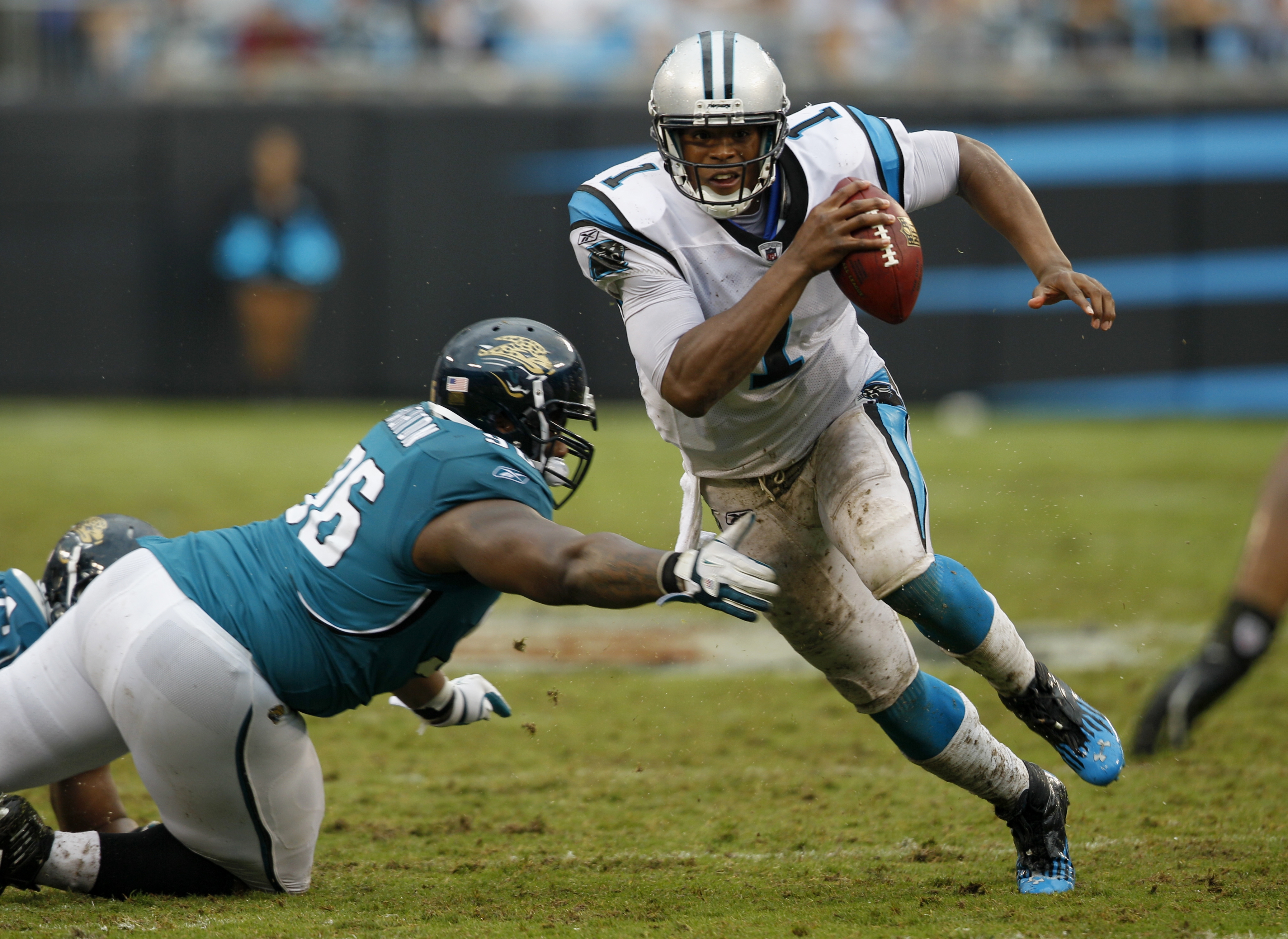 Carolina Panthers Cam Newton scrambles away from Jacksonville Jaguars