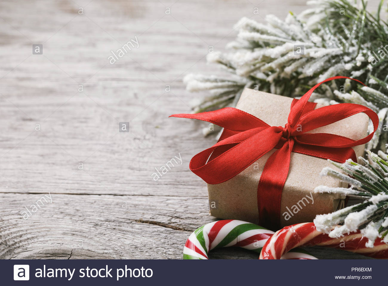 Christmas background and decorations on right side of wooden table