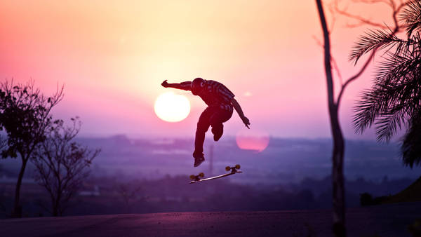 Skater Boy Pink Skies Aesthetic Wallpaper