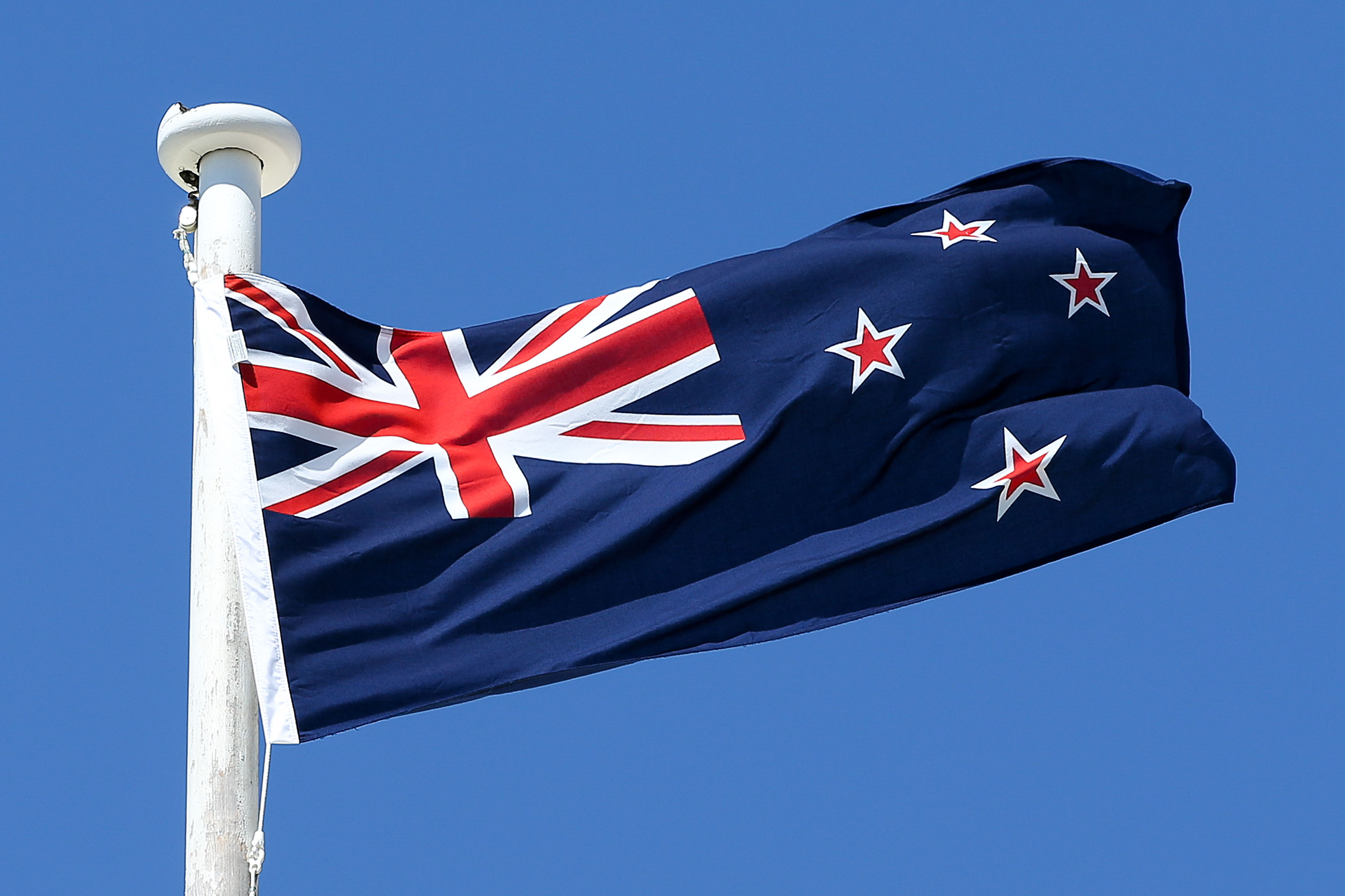 Newzealand National Flag Waving In Wind Hd Wallpaper Download