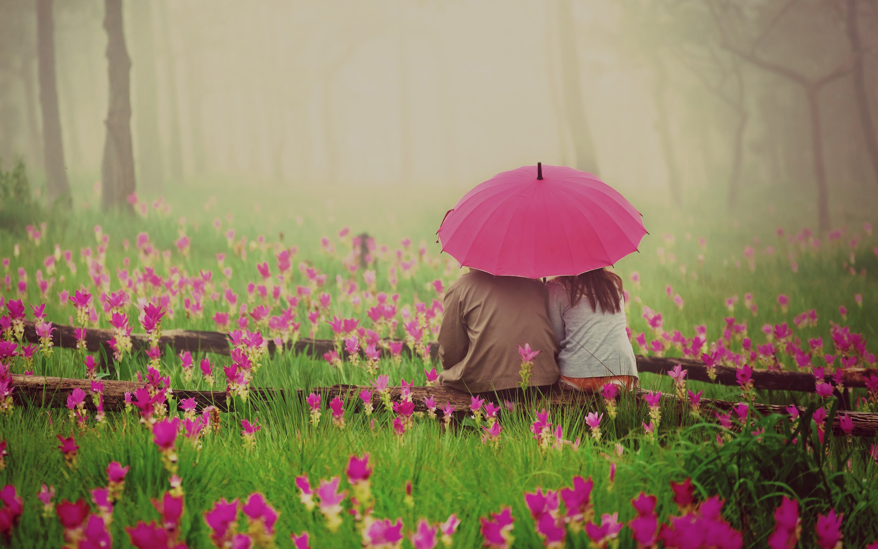 Romantic Couple Under Umbrella Wallpaper
