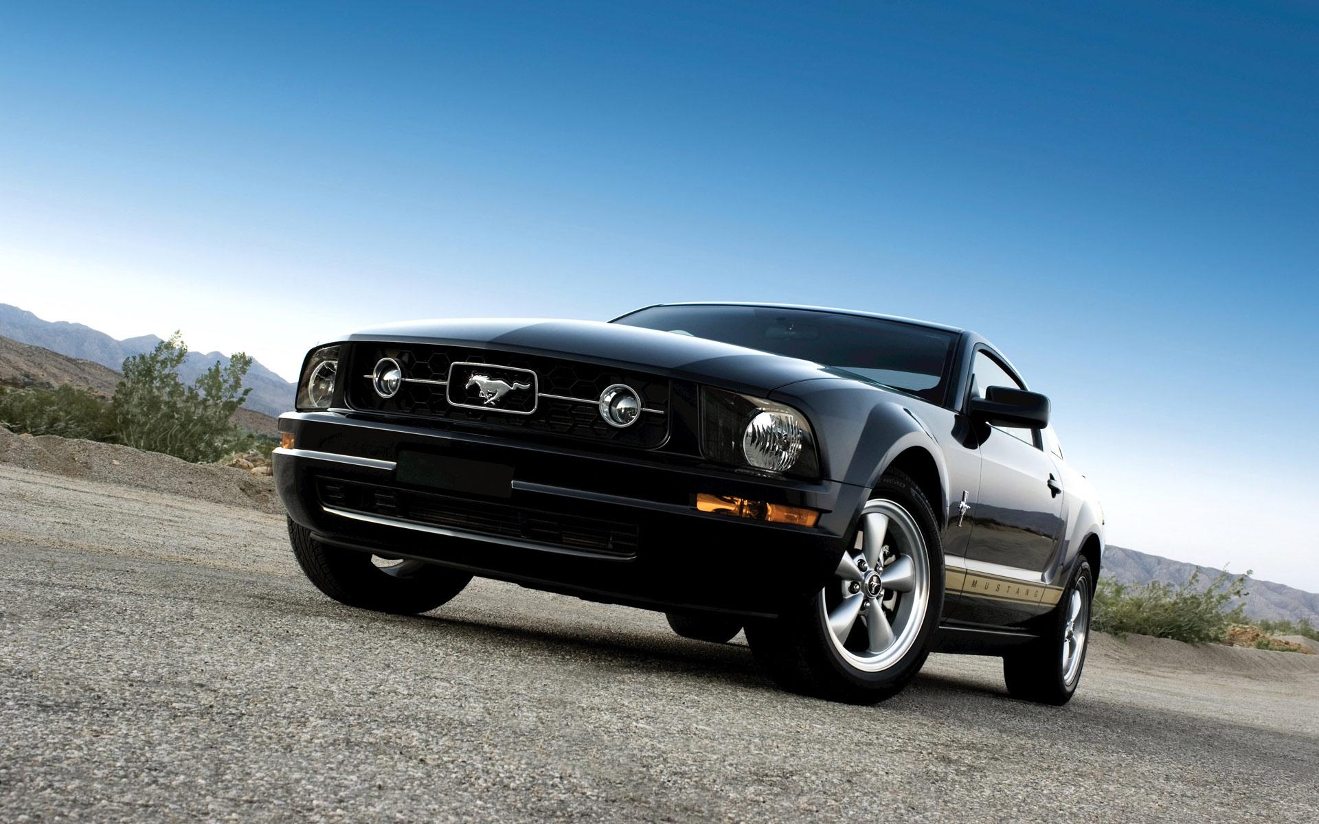 Black Ford Mustang Coupe on Desert Road
