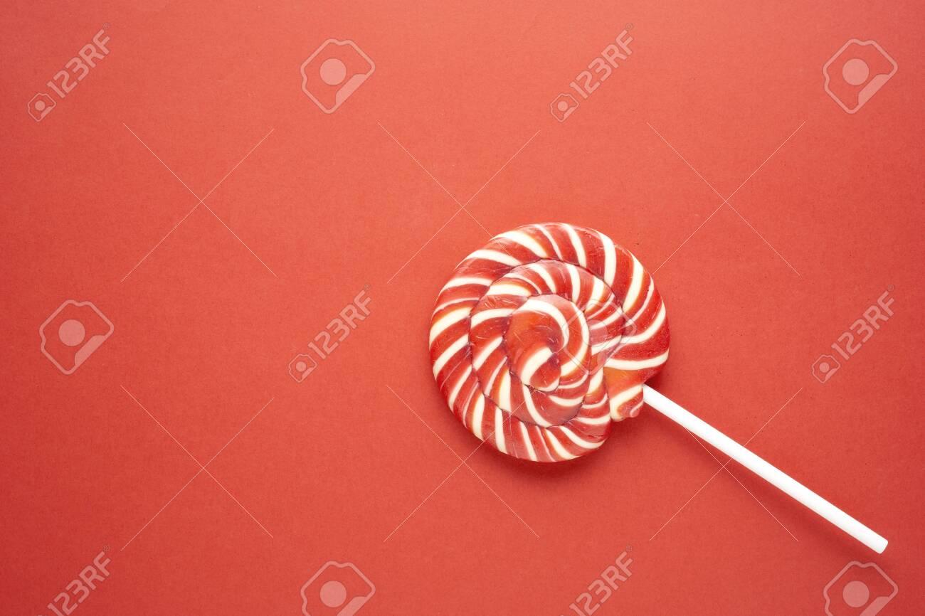 Free download Creative Concept Photo Of Lolli Pop Candy On Red
