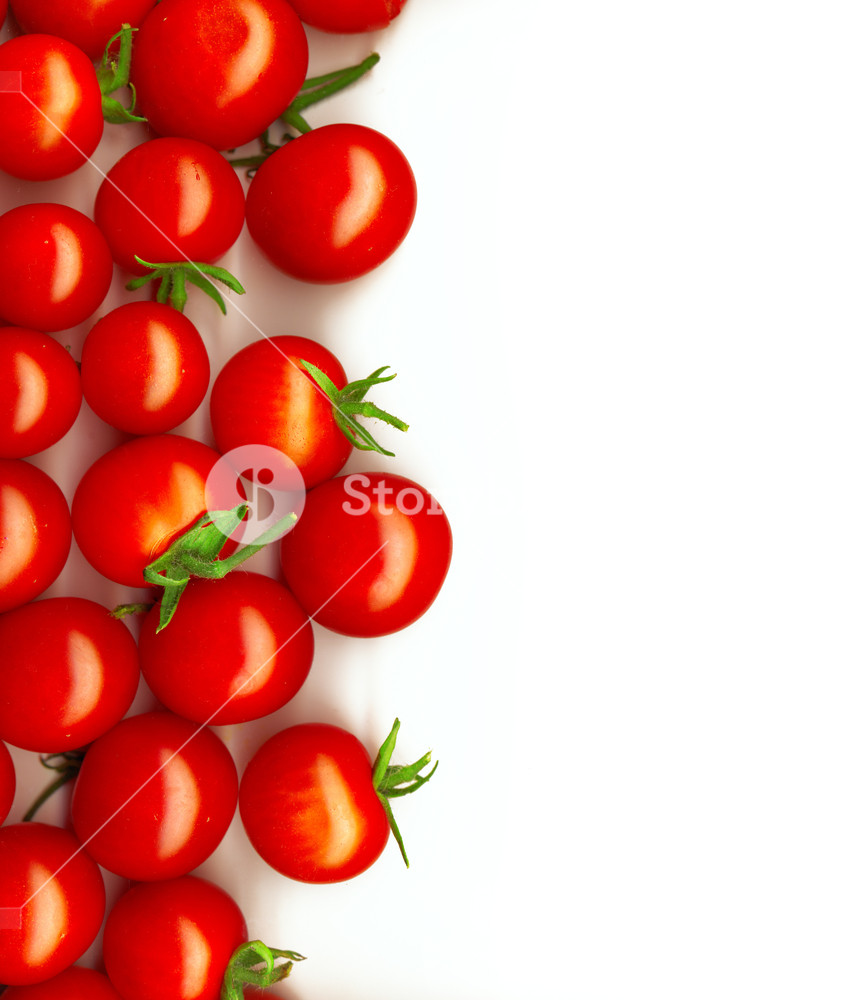 Bright Red Tomatoes Isolated On A White Background Royalty