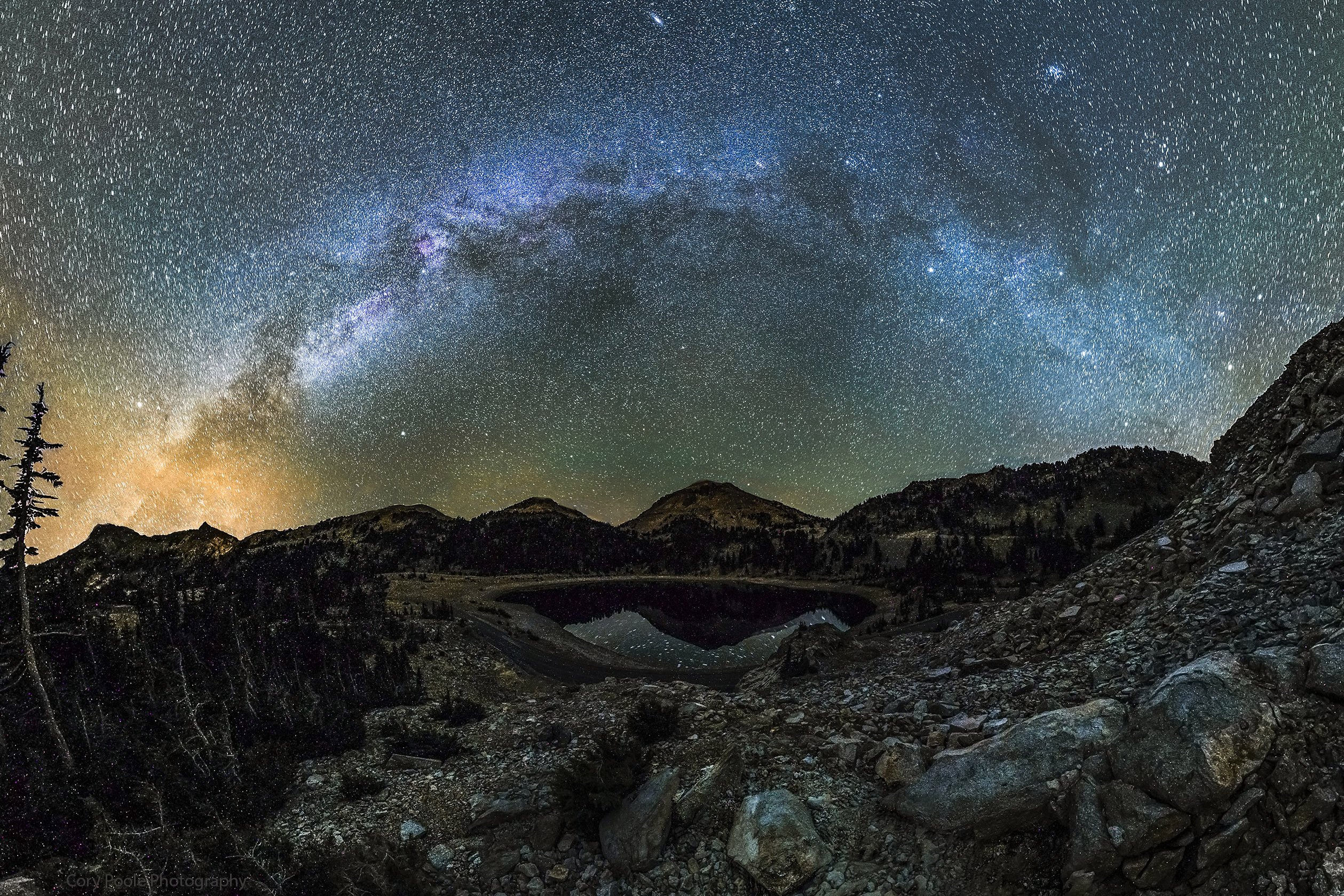 The Milky Way Arches Over Mt Lassen And Lake Helen In