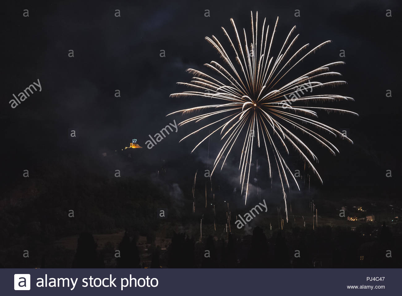 White Fireworks With Illuminated Church Of The Patron Saint