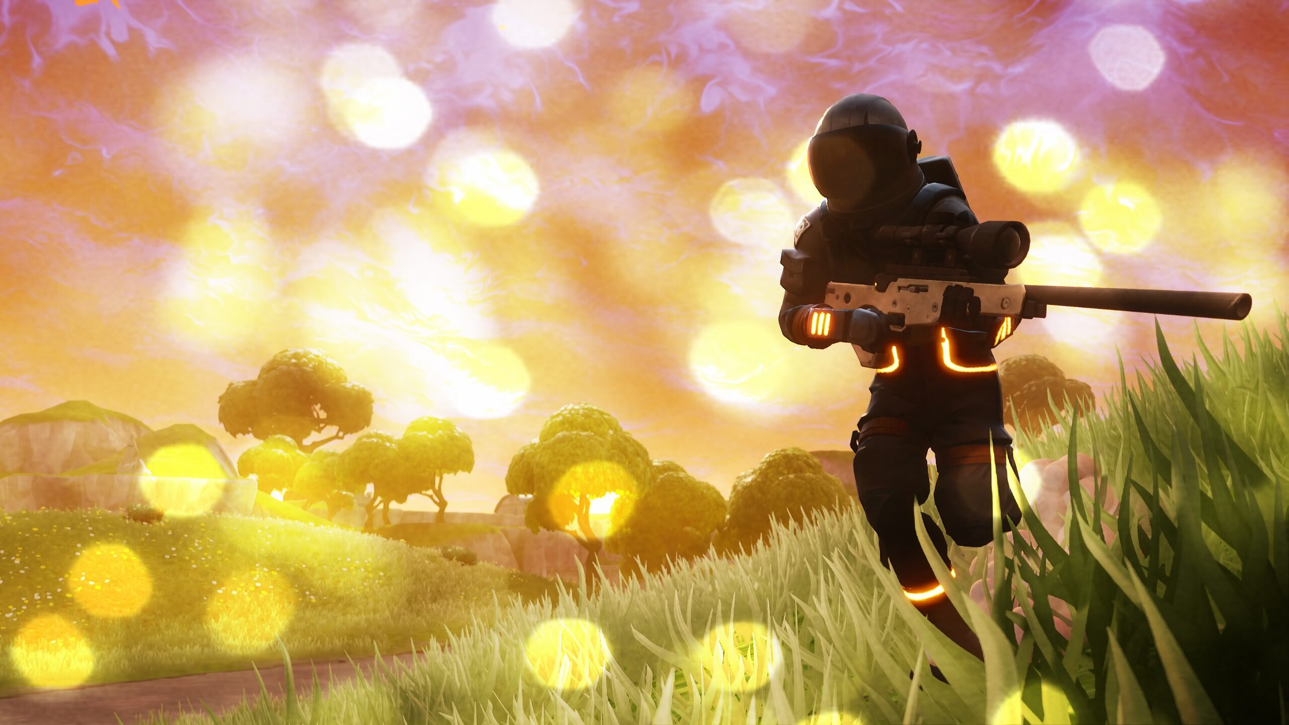 A Fortnite character with a futuristic spacesuit and sniper rifle, running through a grassy field at sunset. This cool Fortnite wallpaper captures the game's vibrant graphics and action-packed gameplay