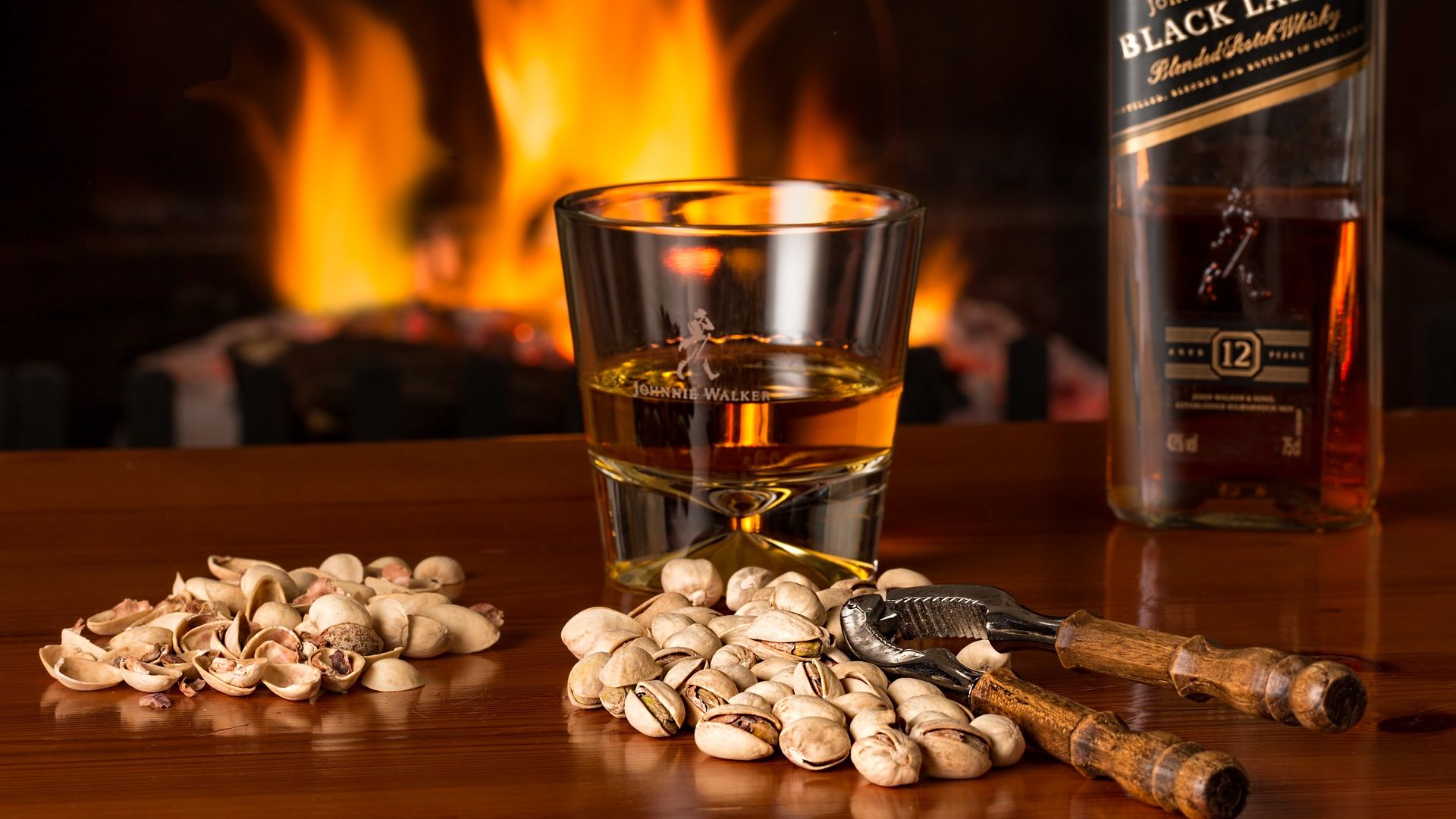 Whisky Alcohol Glass Pistachios And Fire Flames Wallpaper