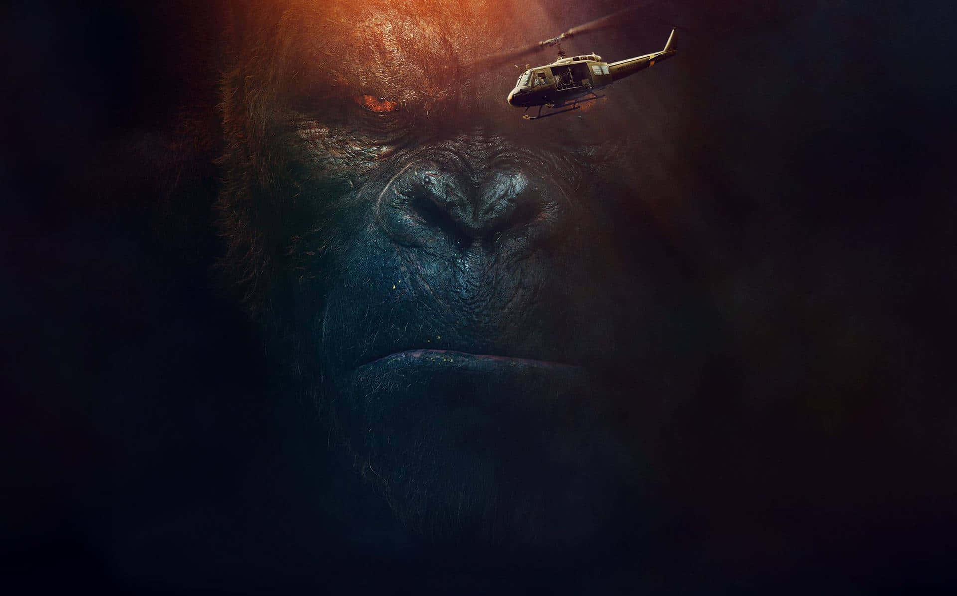 Close-up of Kong's face with a helicopter in the background, from the movie Kong: Skull Island