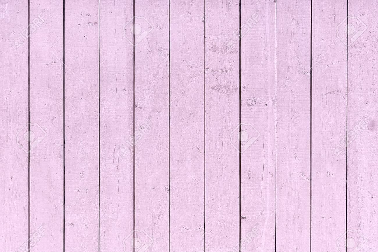 A Fence Of Vertical Pink Boards Background With Texture