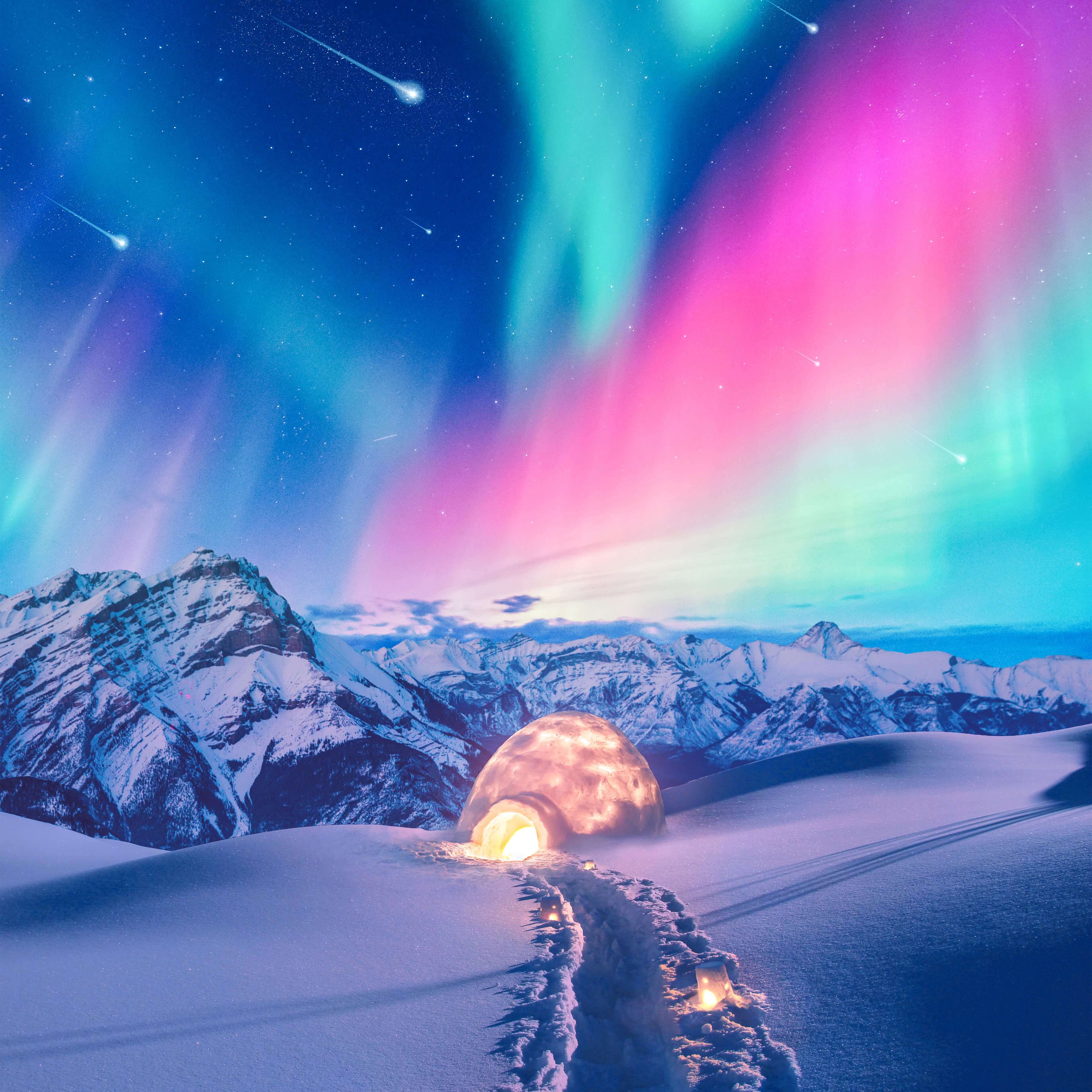 A cozy igloo glows warmly under a vibrant aurora borealis, nestled in a snowy mountain landscape. Shooting stars streak across the sky, adding to the magical ambiance