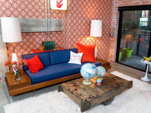 Mid Centrury Modern Living Room with Bold Orange Wallpaper and Blue