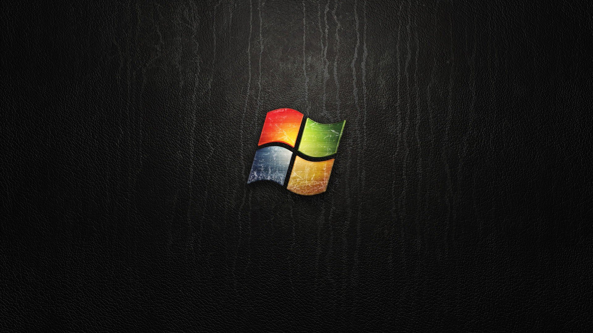 A dark, textured background with a subtly embossed Windows logo, evoking a sleek and professional feel