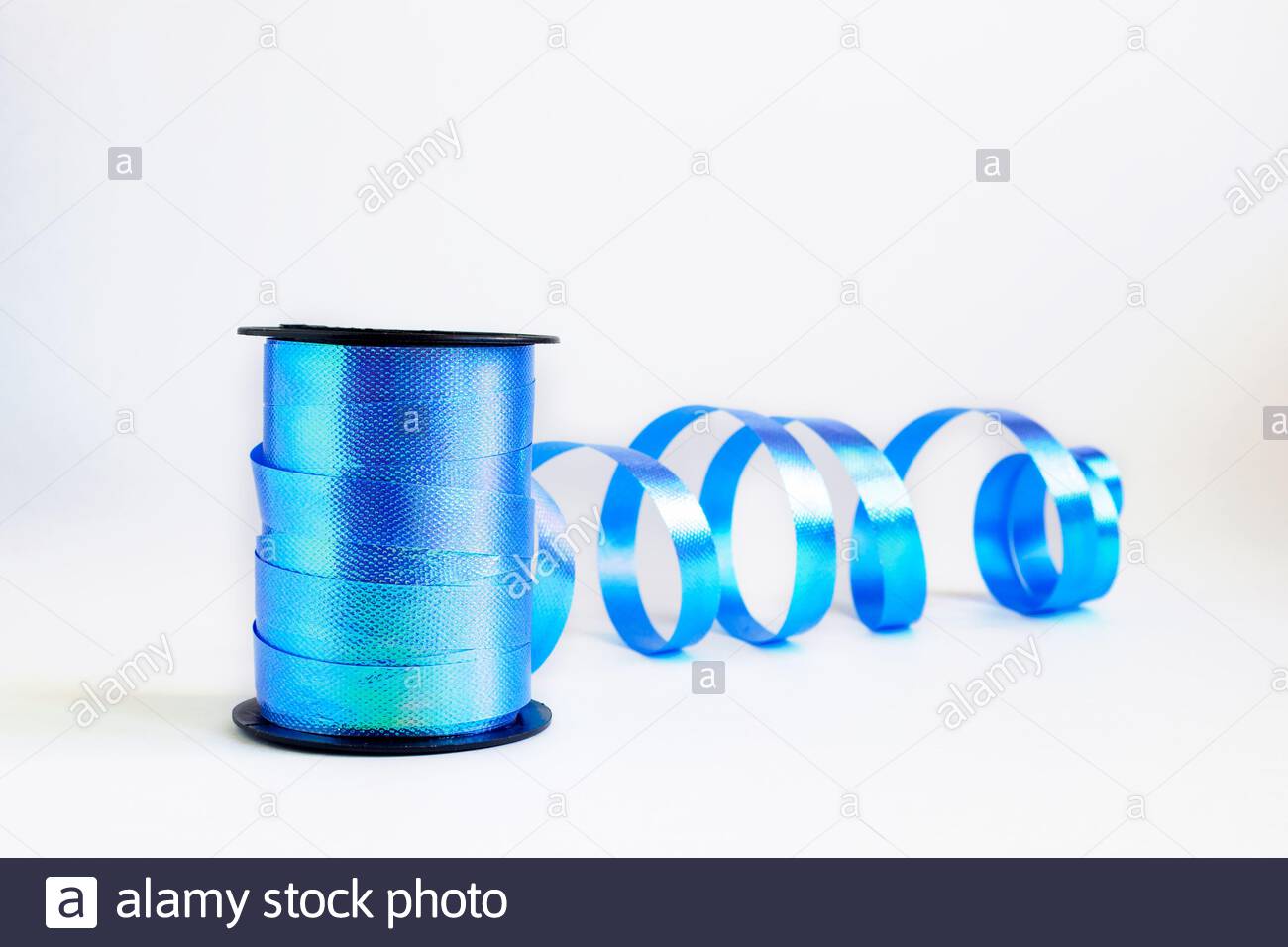 Free download Spool of blue curling ribbon roll for gift wrapping art and crafts [1300x956] for
