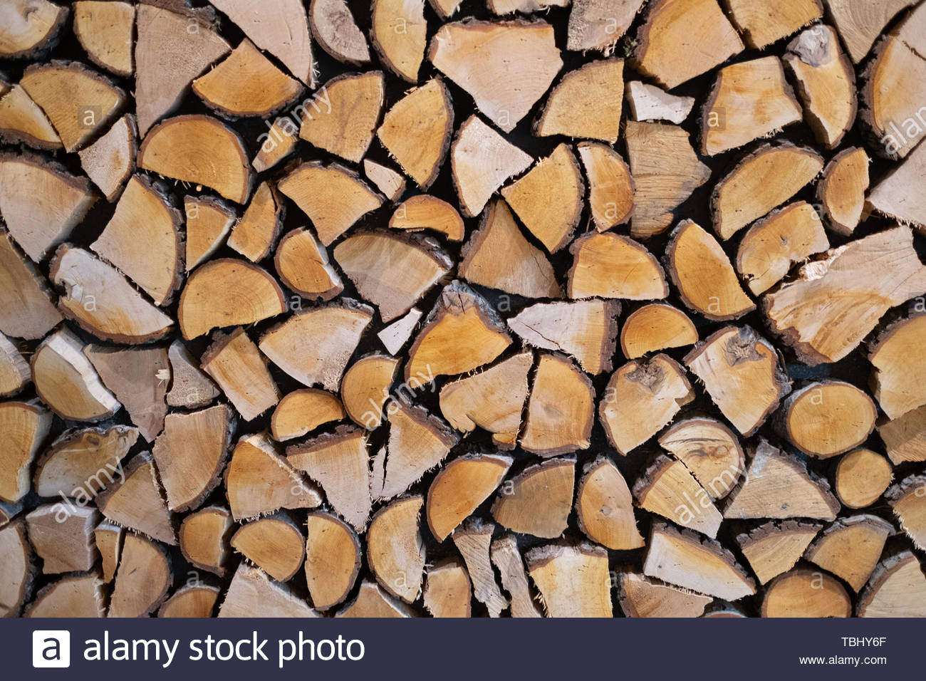 Wall Firewood Background Of Dry Chopped Logs In A Pile