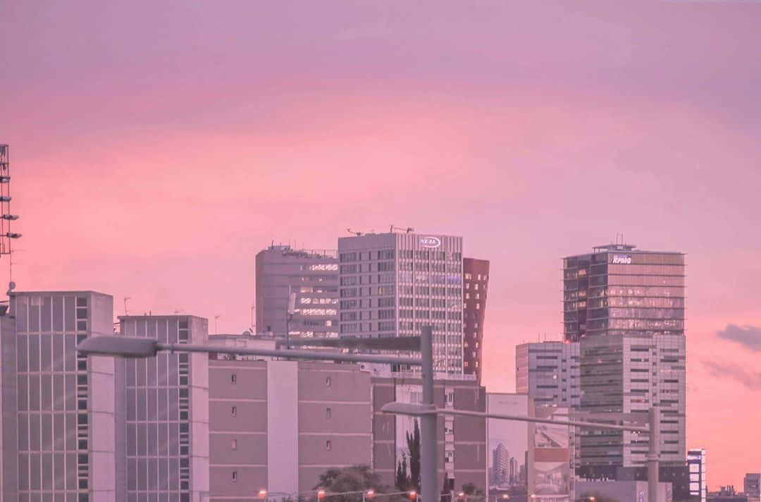 Image A Modern City With Pink Glow Wallpaper