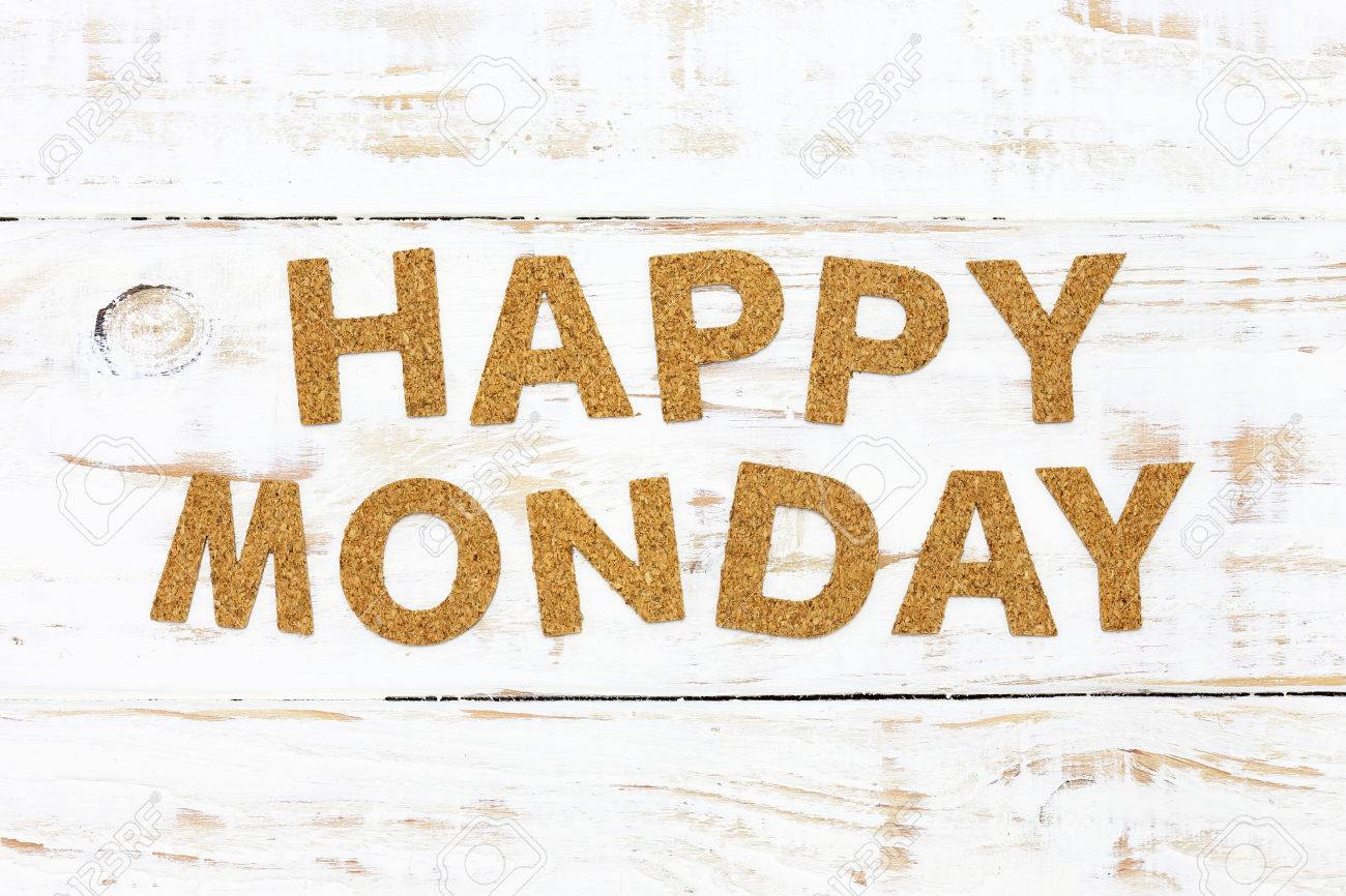The Word Happy Monday Cork On White Wood Background Stock Photo