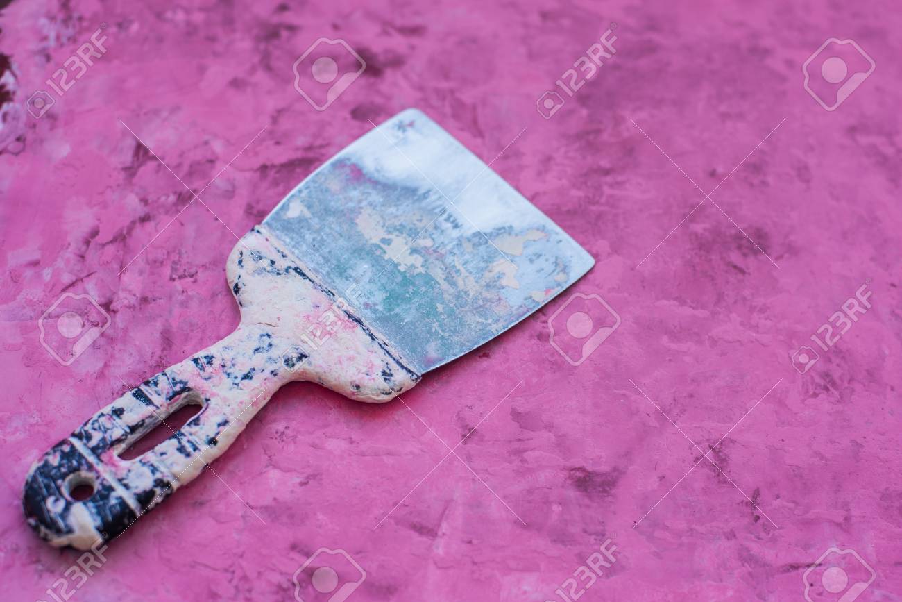Spatula On A Pink Background Putty Stock Photo Picture And