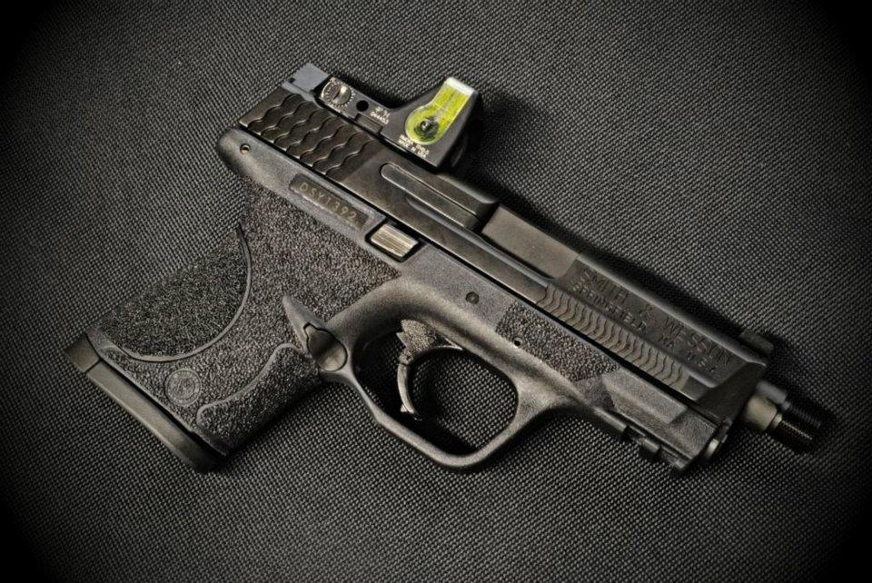 Texturing M P Pact With Cocking Serrations And Grip