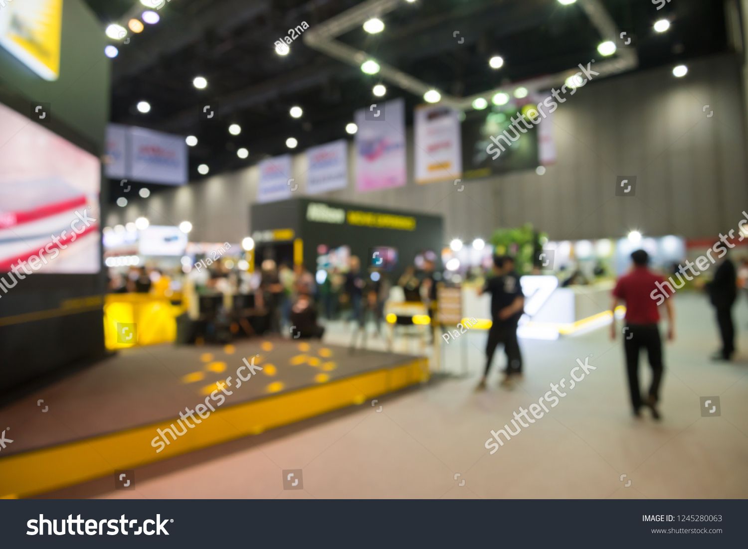 Blur Background Of People In Photo Camera Fair Expo At Big