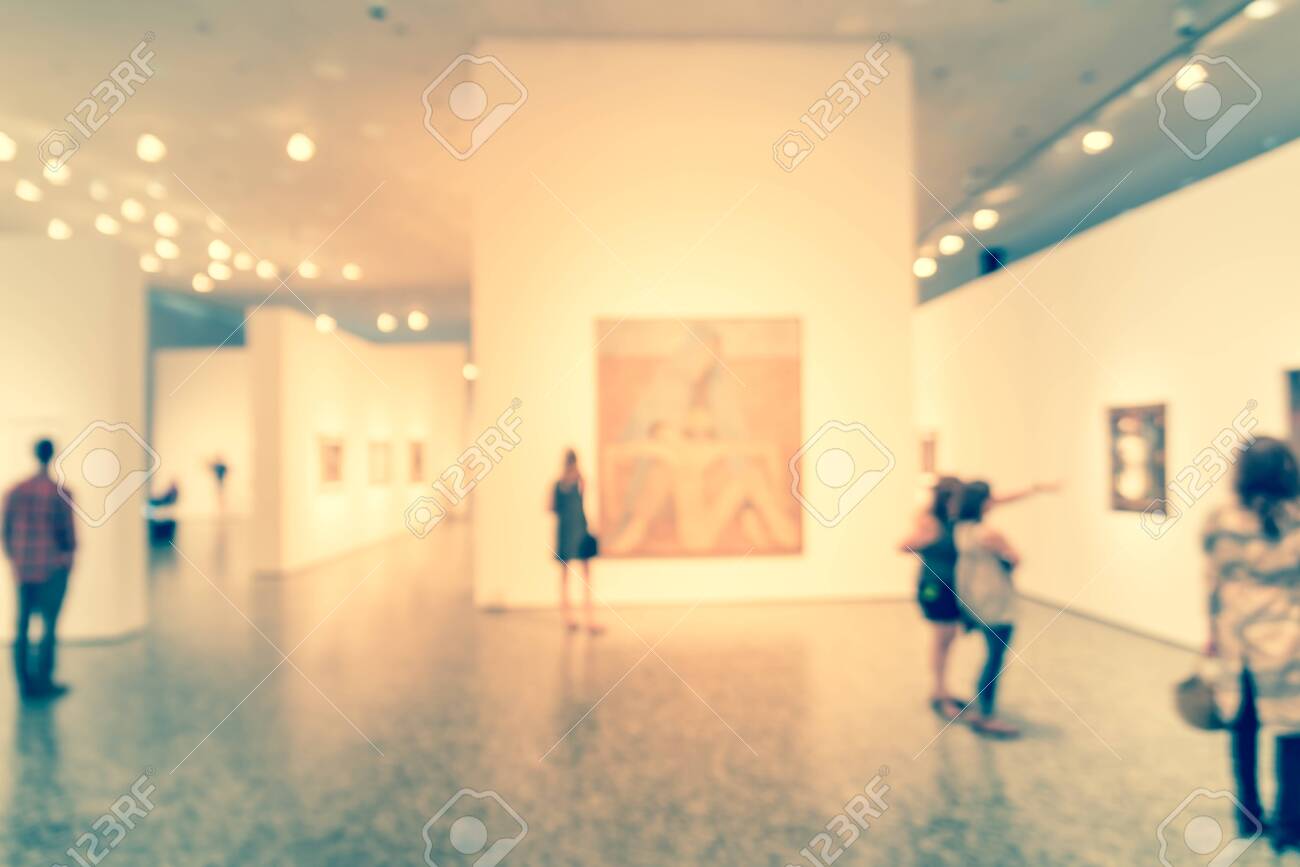 Blurry Background People Looking At Fine Art Display Museum