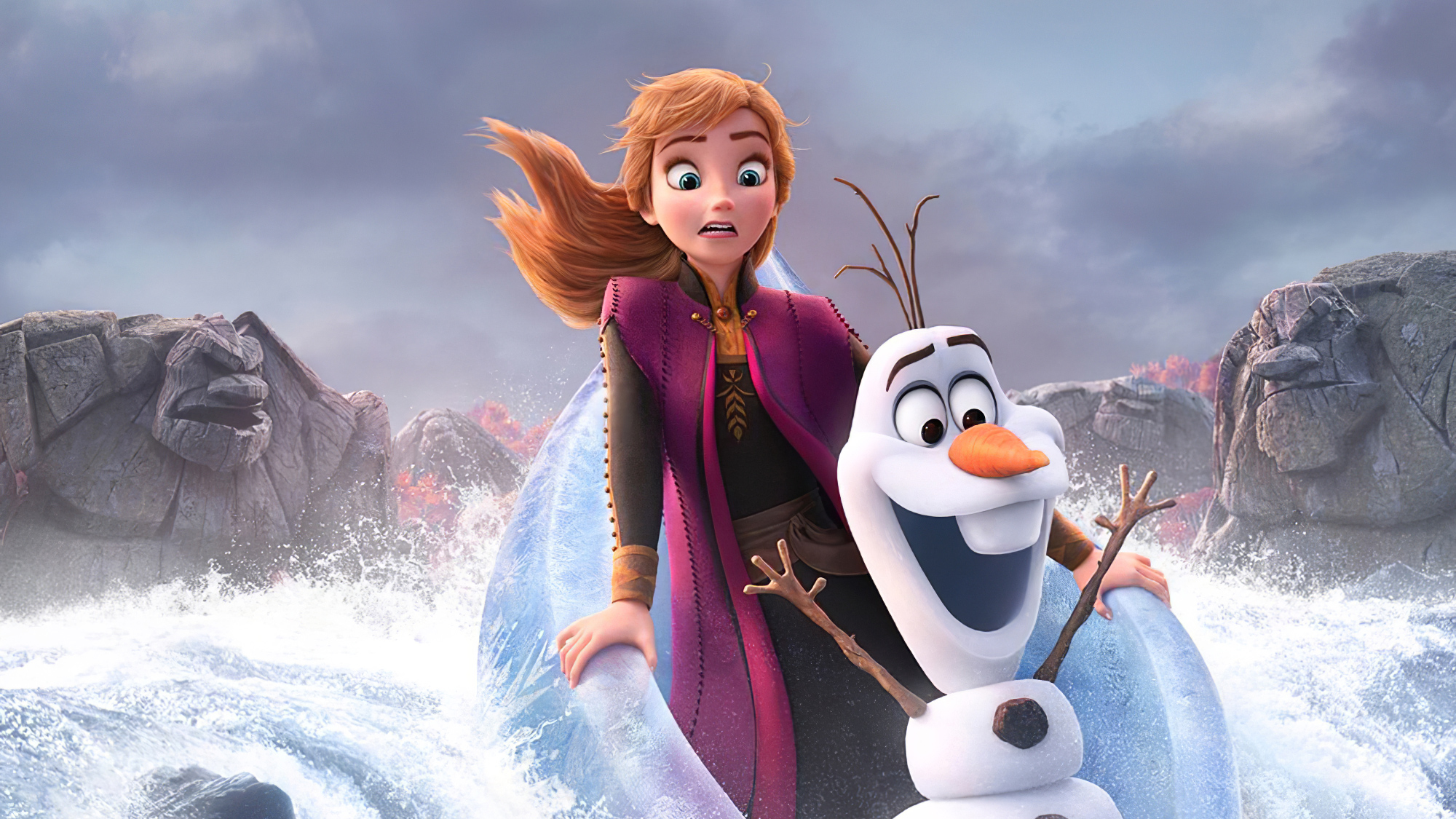 Anna and Olaf riding an ice raft down a river in Frozen 2