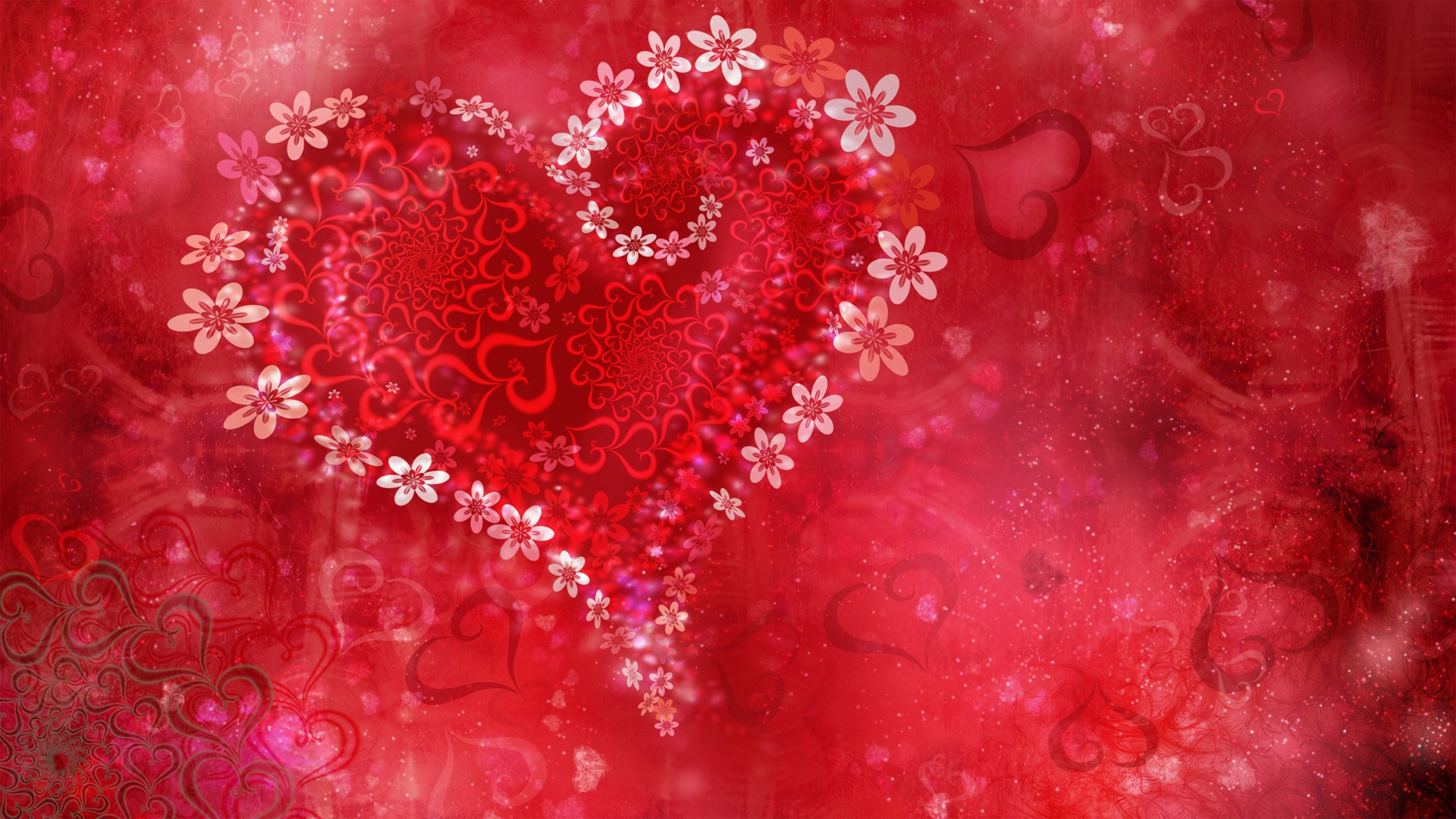 A vibrant Valentine's Day design featuring a large heart composed of smaller hearts and flowers on a red, sparkling background