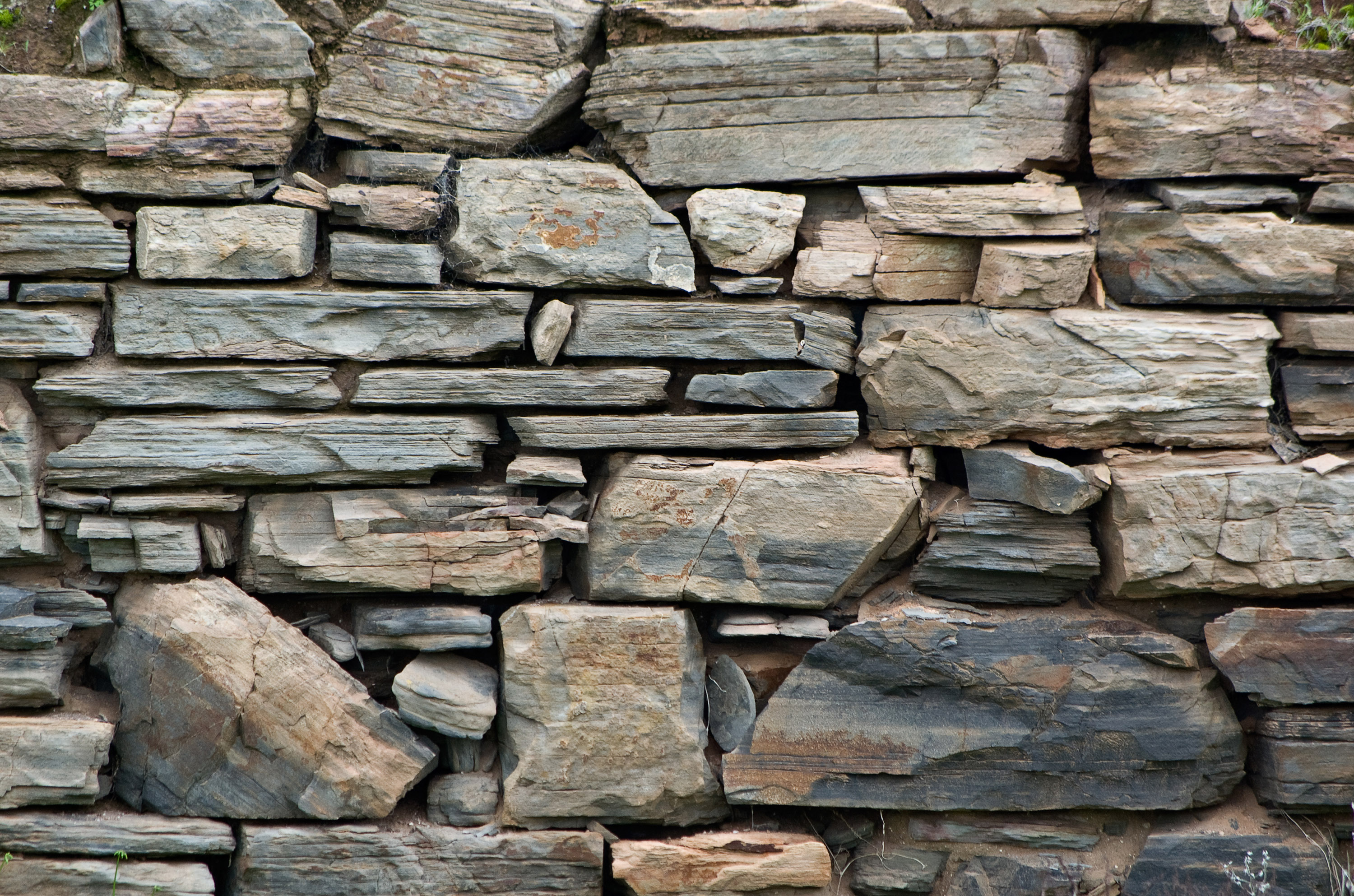 A Stone Wall Background Texture Wallpaper