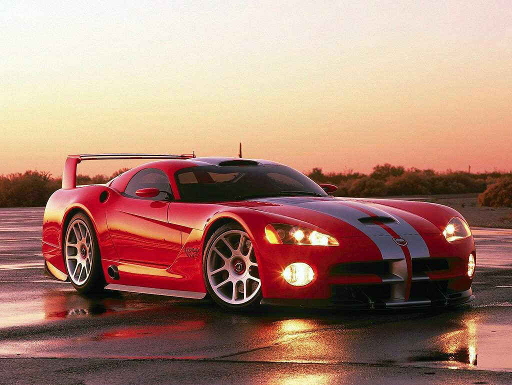 Sleek Red Dodge Viper Concept Car at Sunset