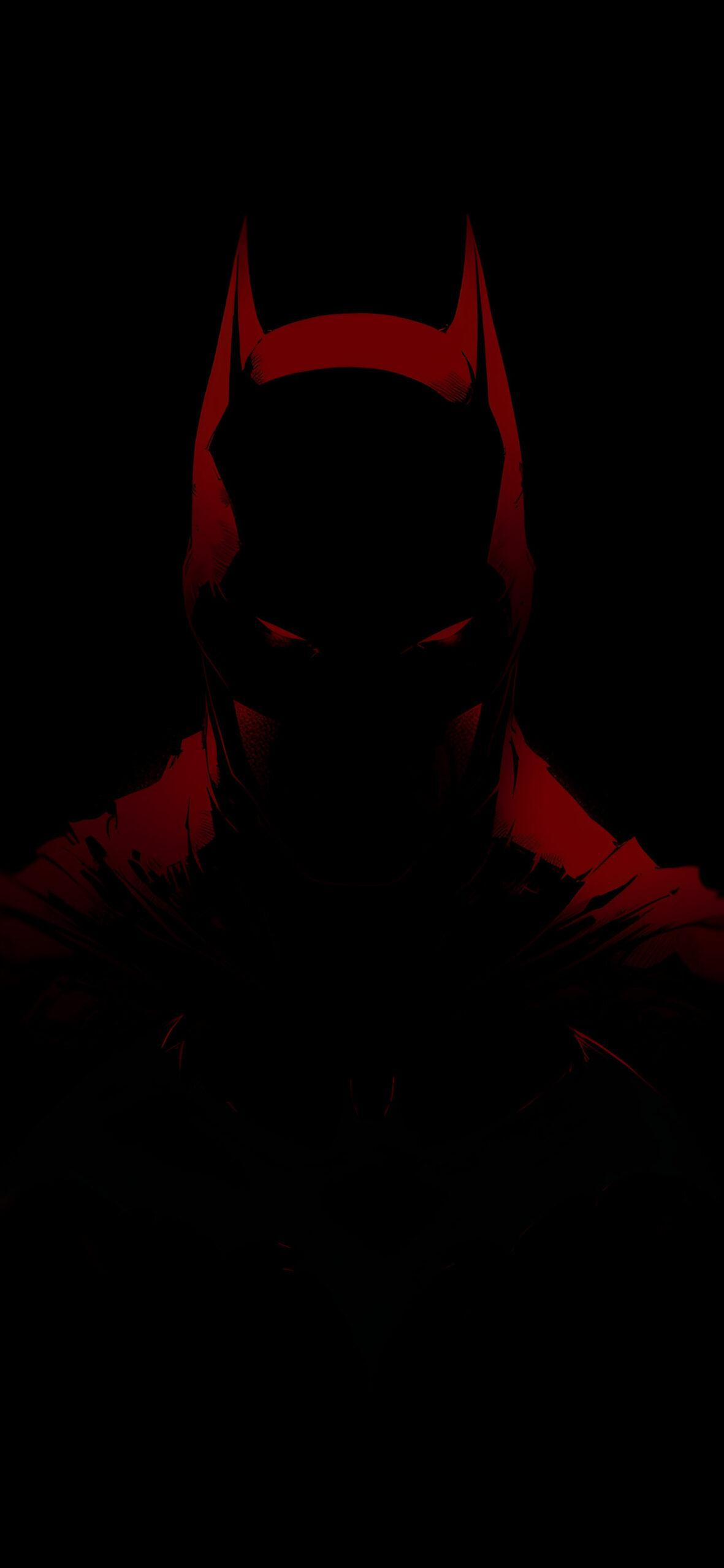 Menacing Batman On Black Background Wallpaper