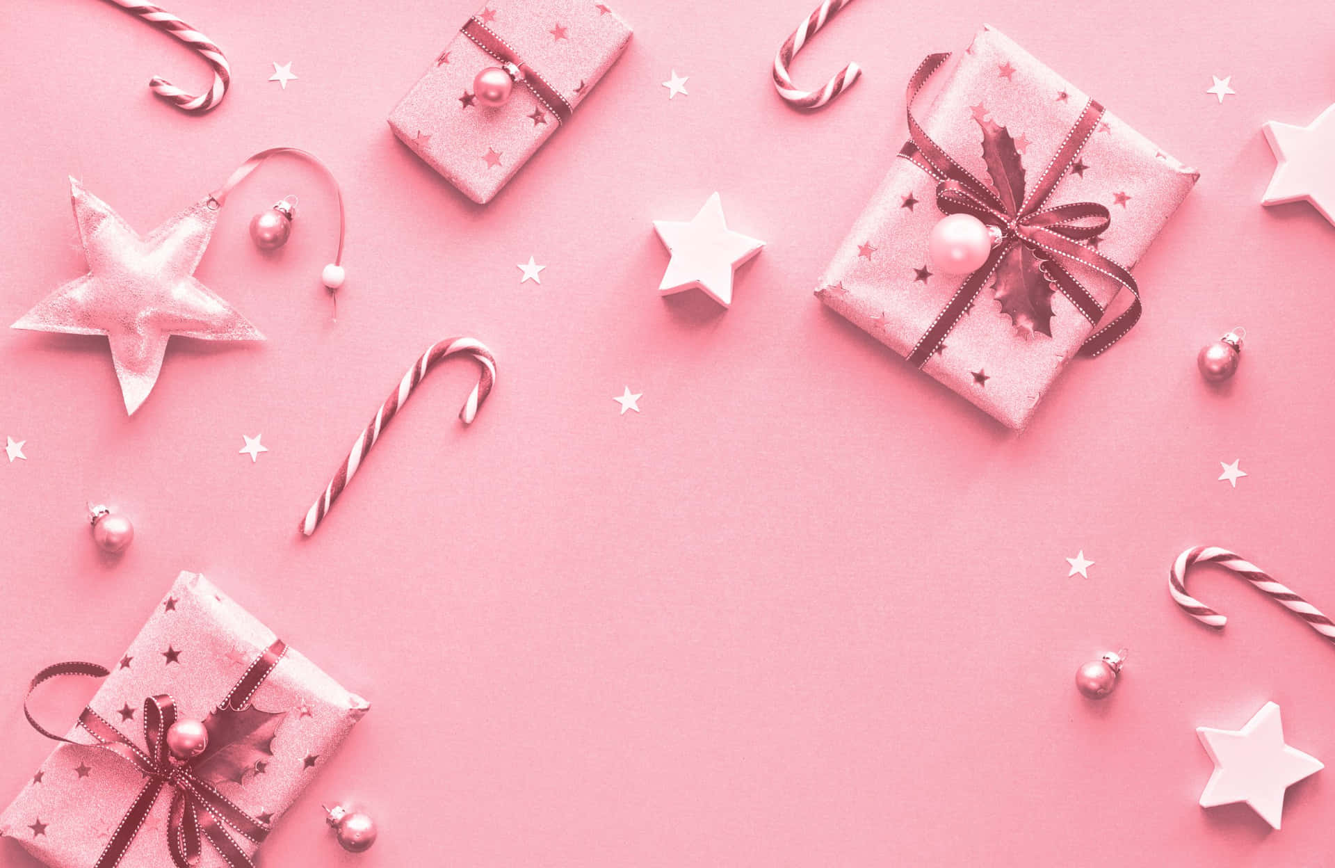 Celebrate The Holiday Season With A Bright And Cheerful Pink Wallpaper