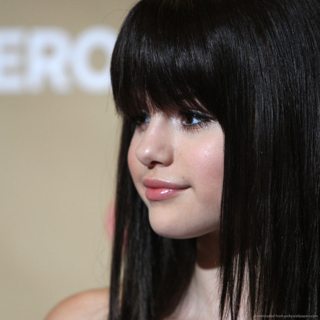 Young Cute Selena Gomez With Fringe Wallpaper For iPad