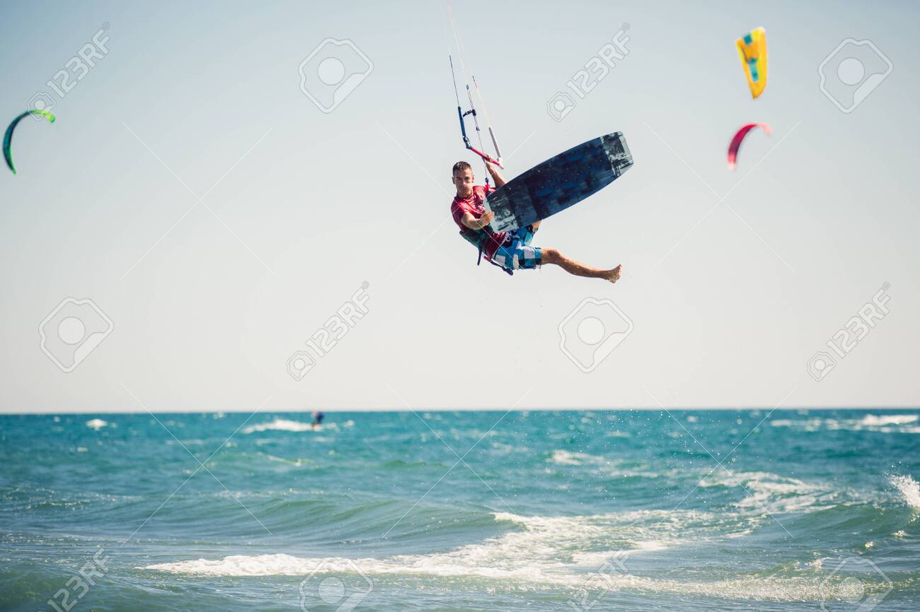 Professional Kiter Makes The Difficult Trick On A Beautiful