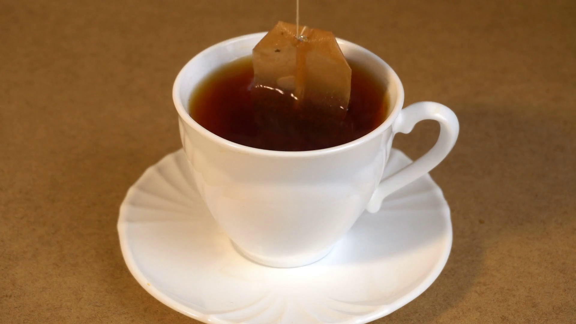Brew Teabag And Lemon In Cup Of Tea Stock Video Footage