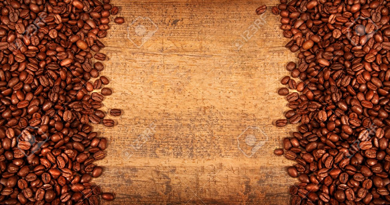 Roasted Coffee Beans On Rustic Wood Background Stock Photo