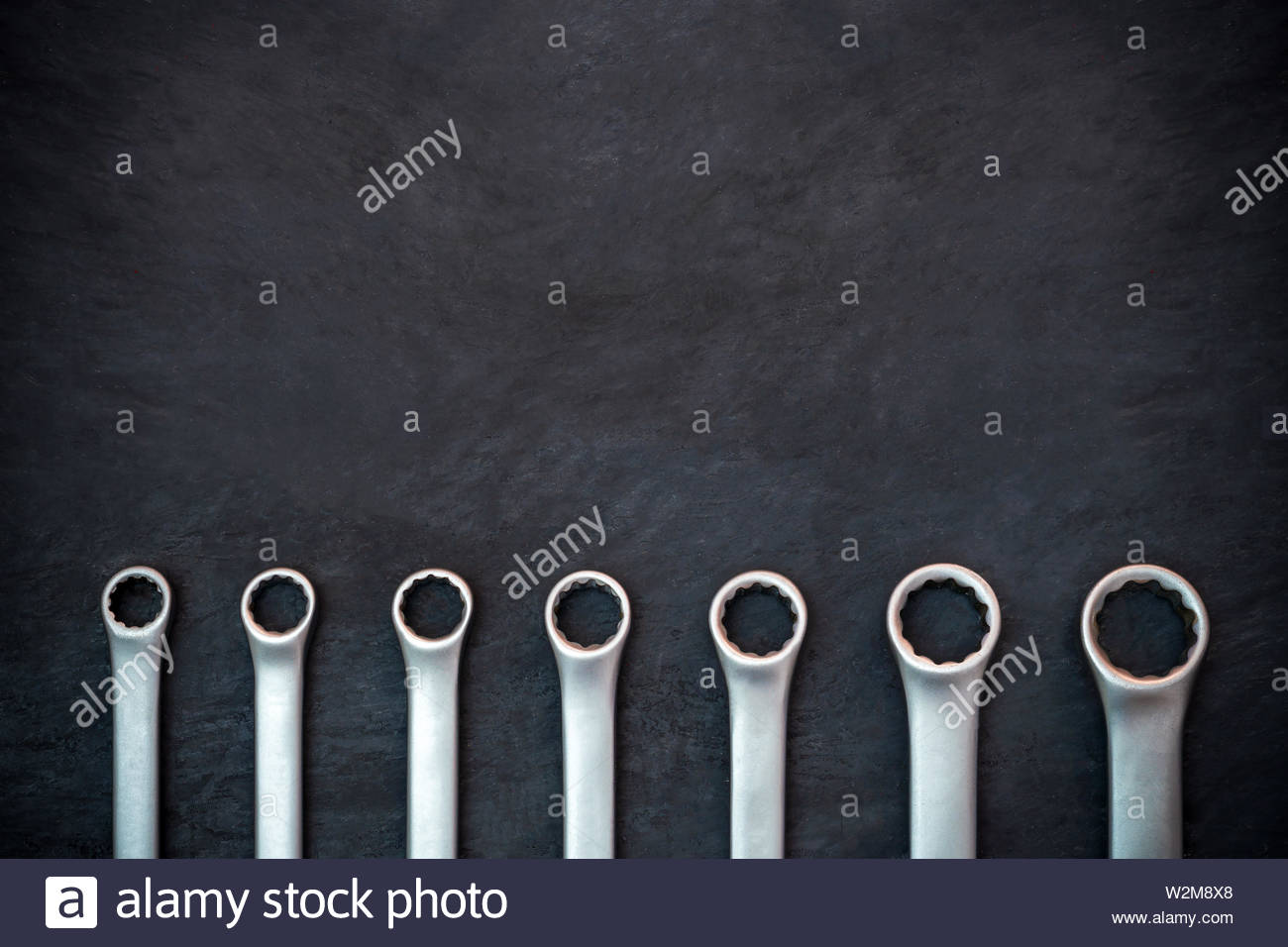 Craftsman Tool On Black Cement Background Copy Space For Your