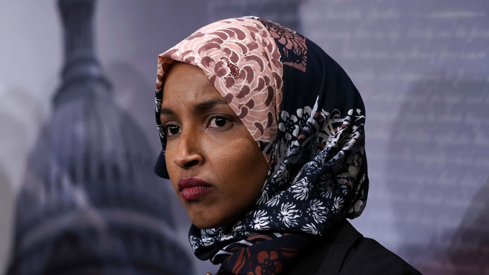 Ilhan Omar Deep In Thought Wallpaper