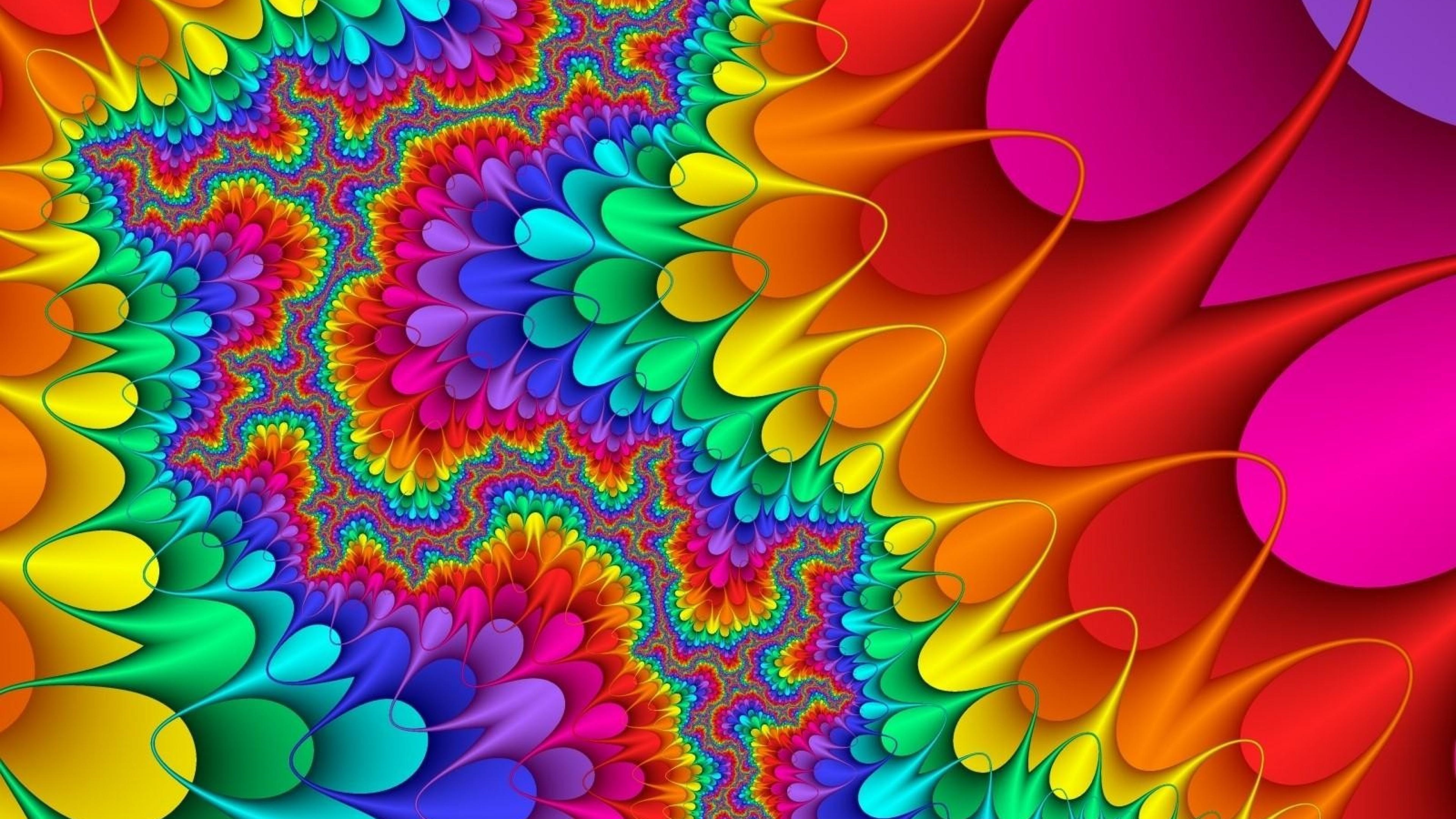 A vibrant and colorful abstract fractal design, swirling with rainbow hues and dynamic shapes, perfect for a computer background