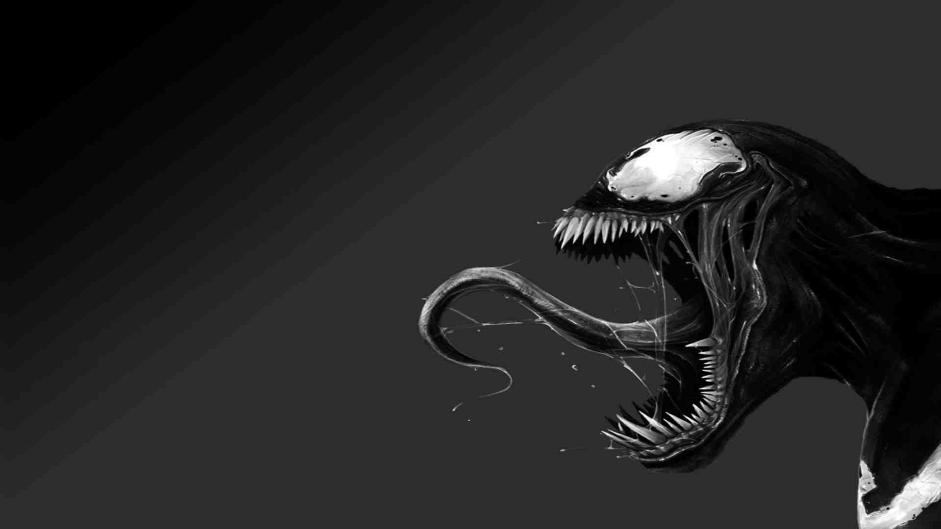 A dramatic grayscale close-up of Venom, the iconic Marvel Comics anti-hero, baring his sharp teeth and extended tongue against a dark background