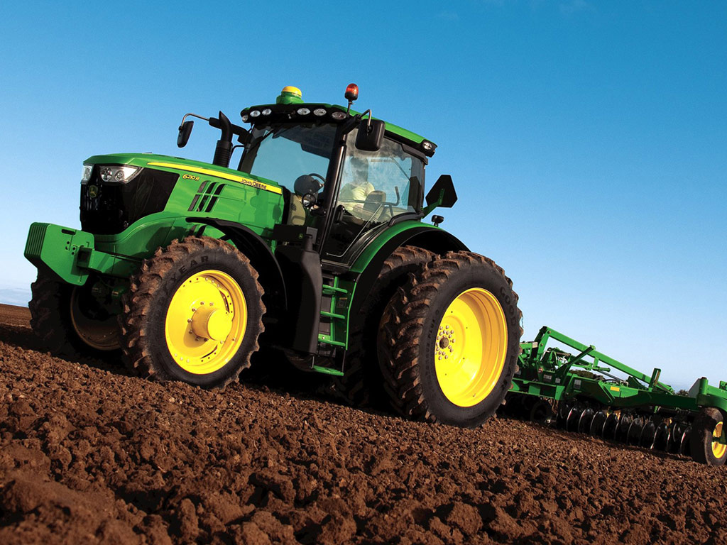 Showing Passion For Agriculture With John Deere Puter Wallpaper