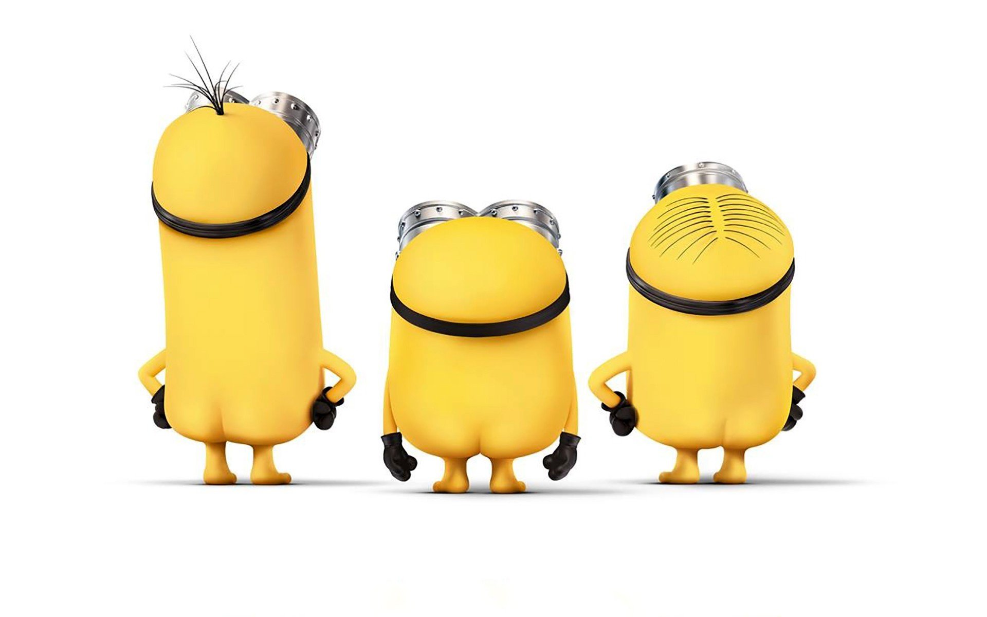 Three Minions from Despicable Me showing their backsides