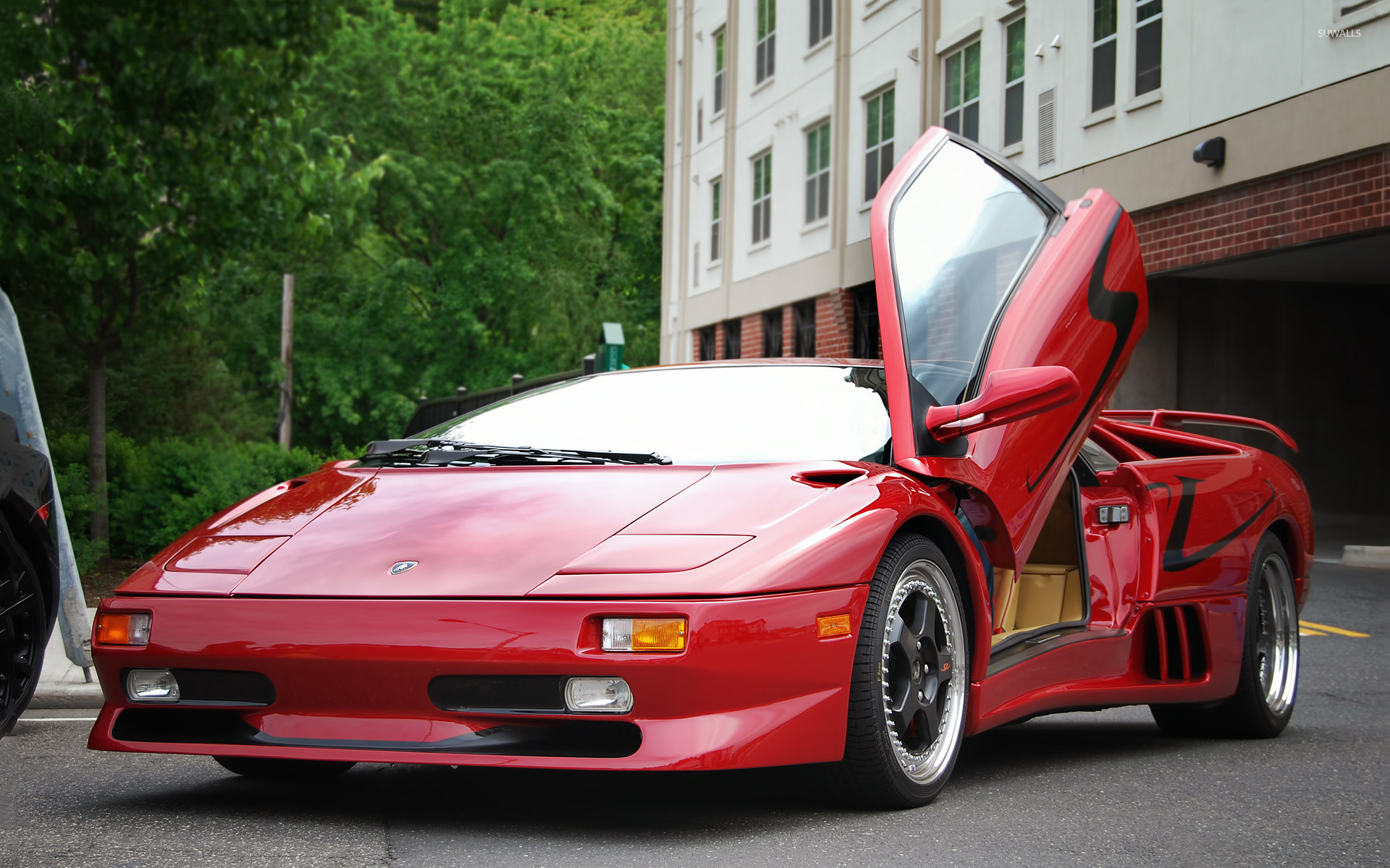 Red Lamborghini Diablo With An Open Door Front Side Wallpaper
