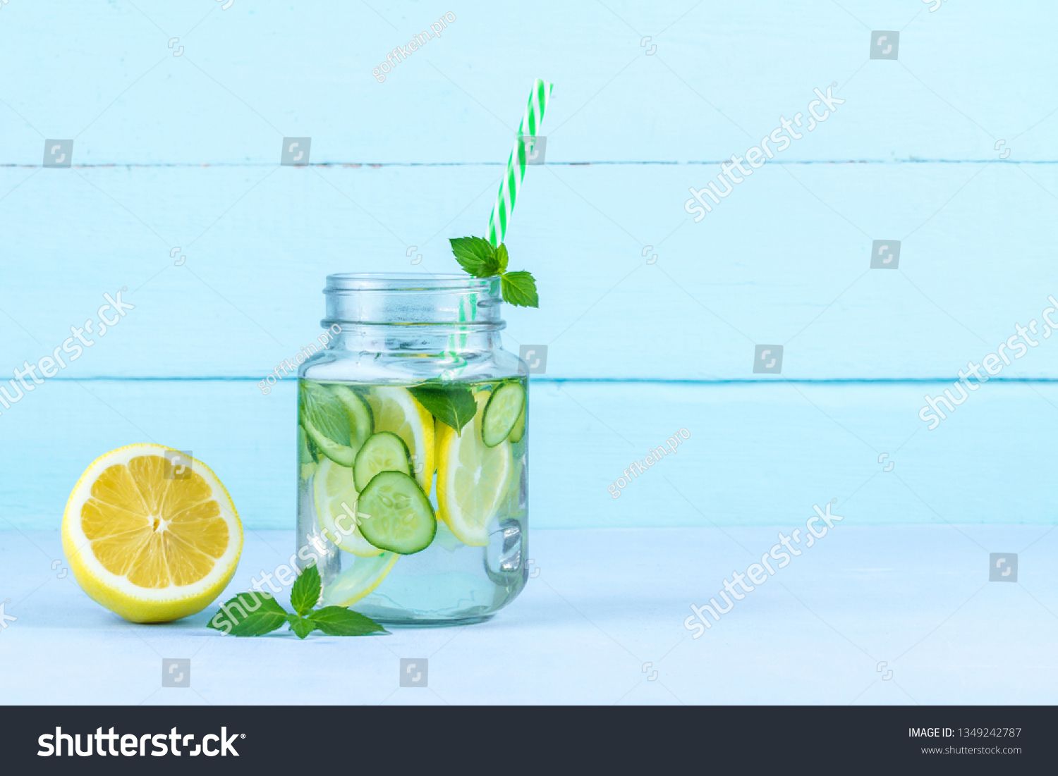 Detox Lemon Drink On A Blue Background Sponsored Affiliate