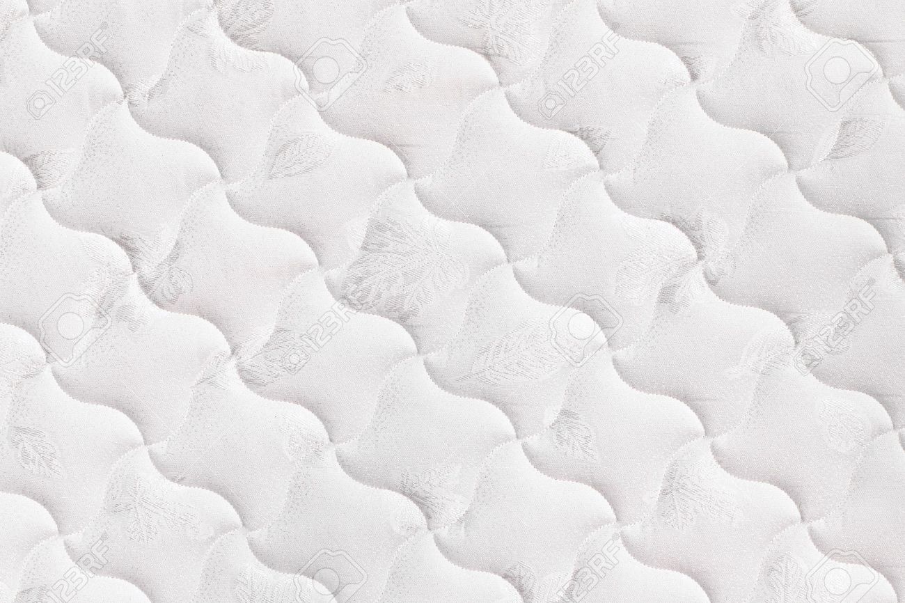 Background Of Soft Fortable Quilted White Mattress Stock Photo