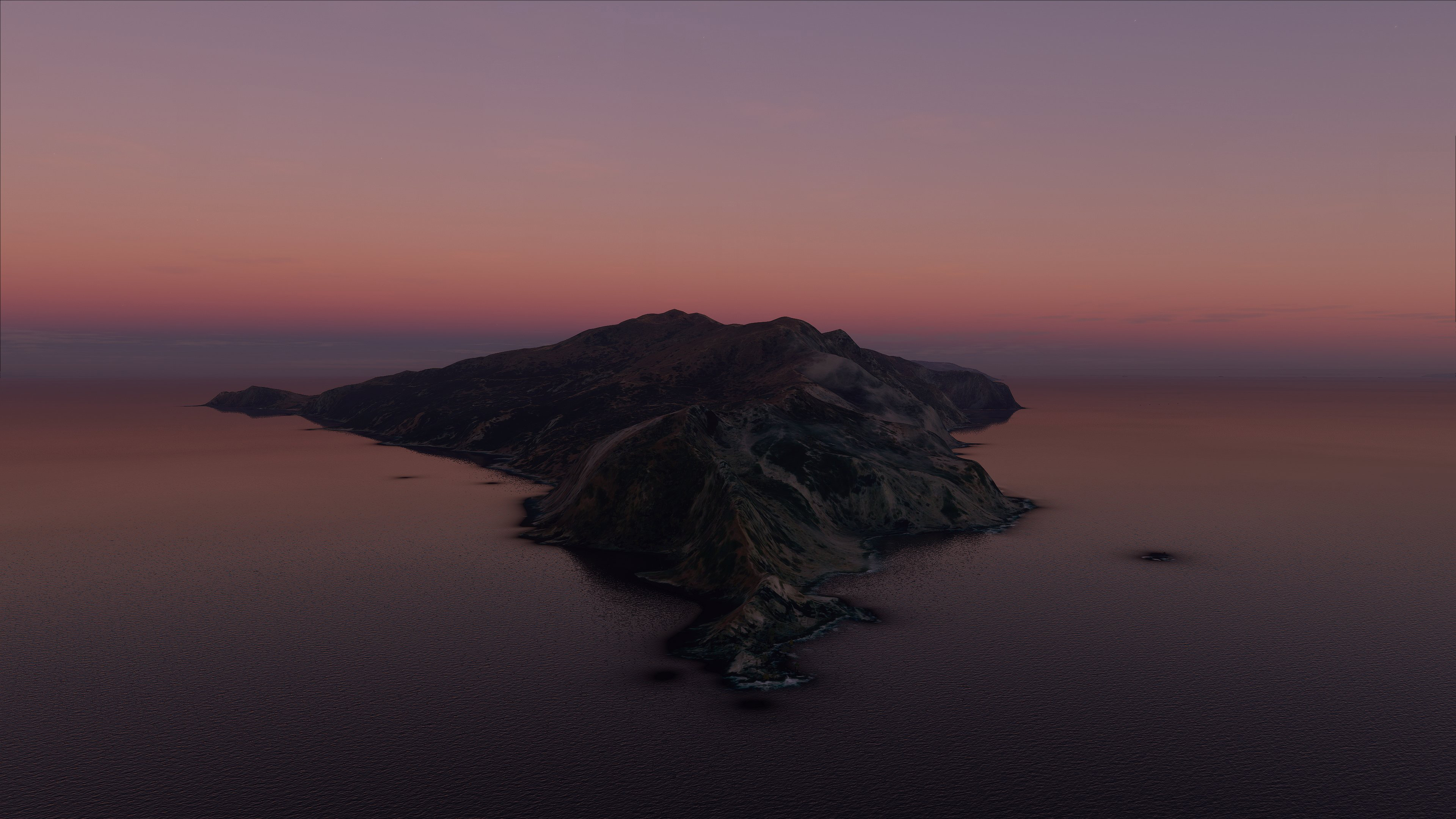 A lonely island at sunset, viewed from above in 4K resolution