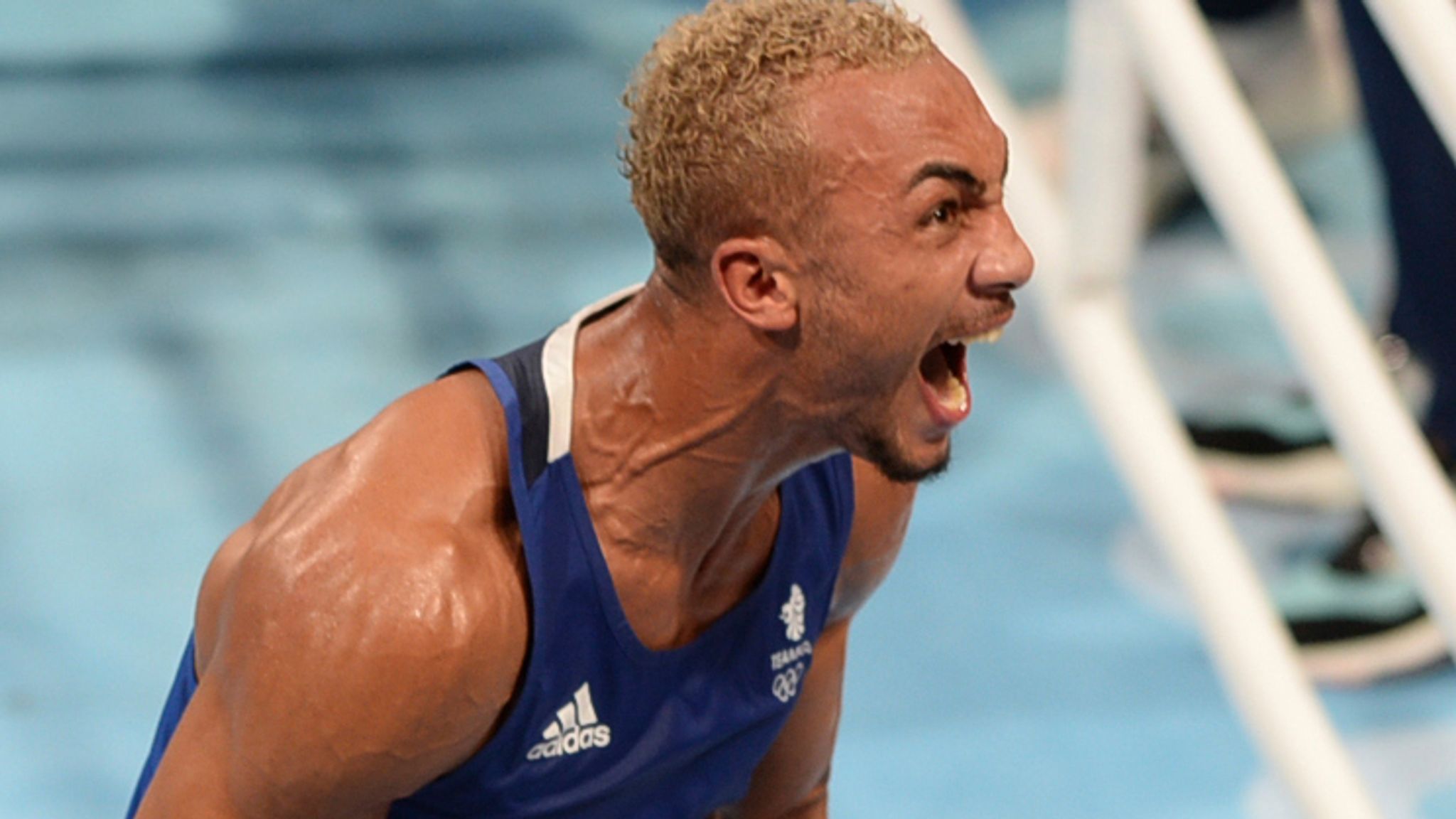 Benjamin Whittaker roars in celebration or frustration during a boxing match