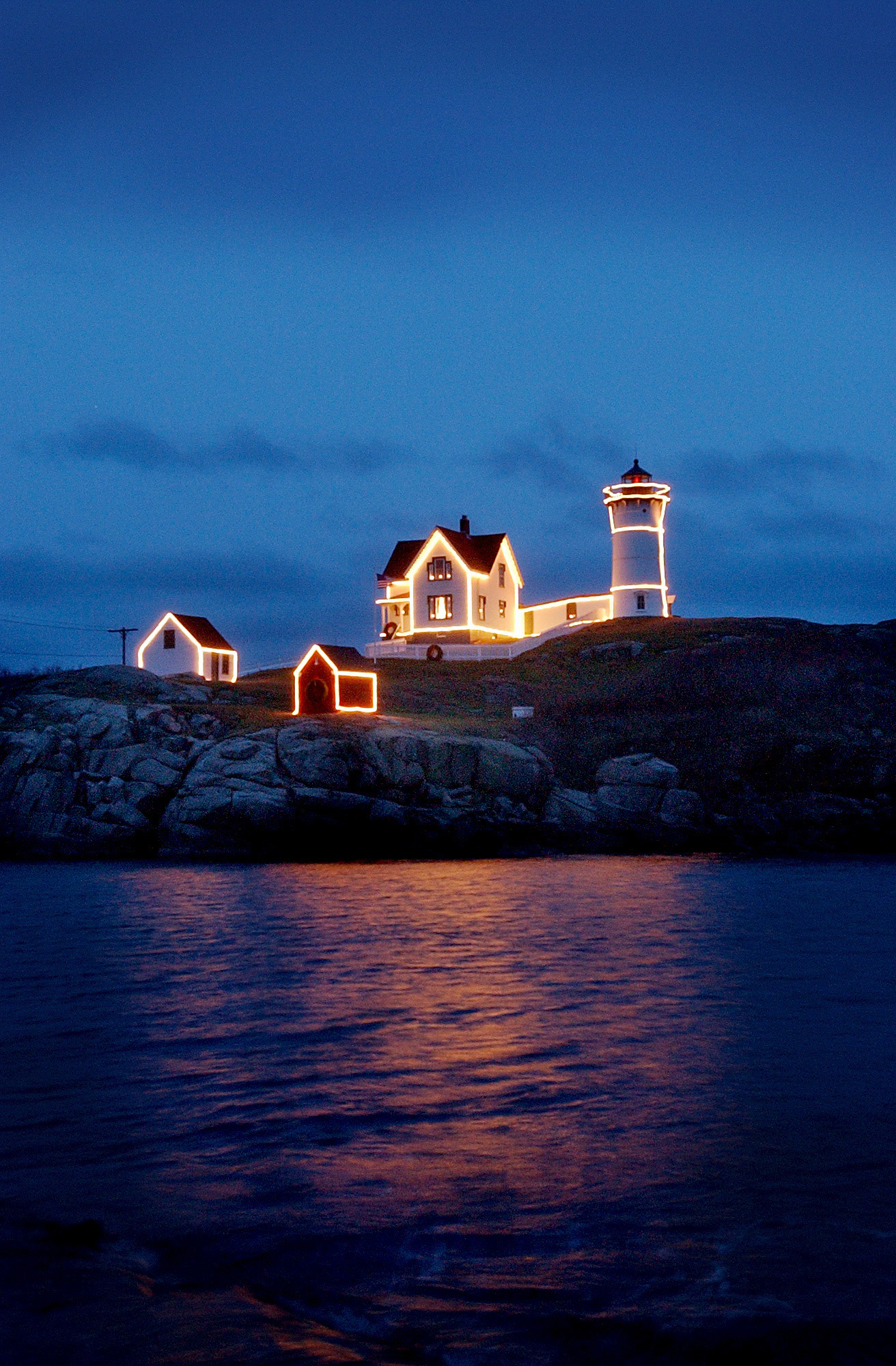 The lighting of the Nubble Lighthouse in York Beach Maine truly