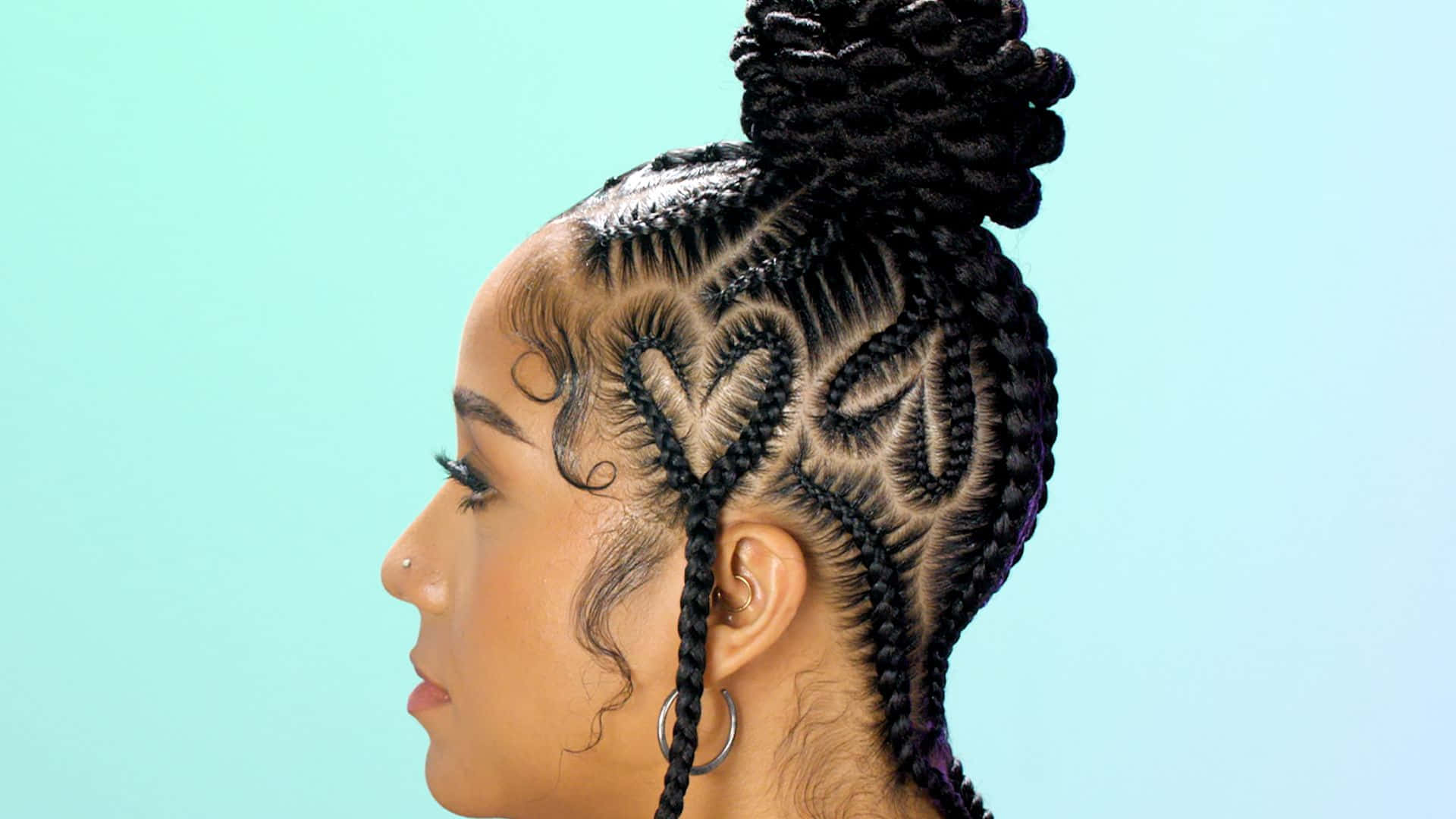 A Woman With Braids In Her Hair Wallpaper